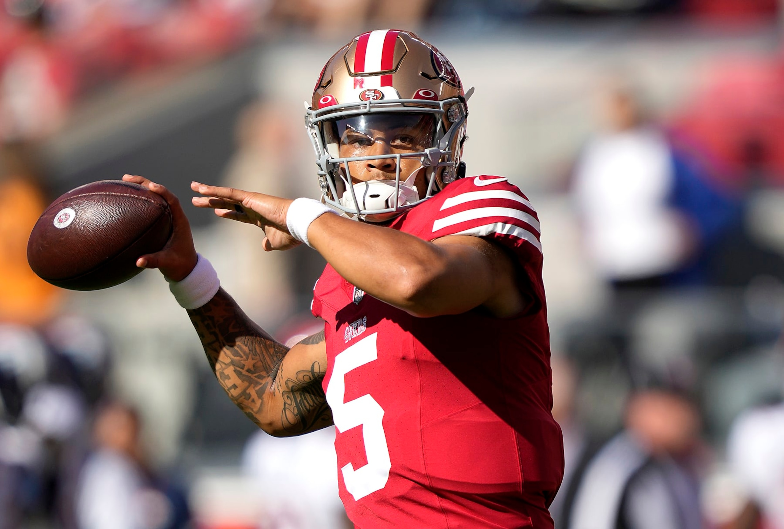 SANTA CLARA, CALIFORNIA - AUGUST Trey Lance #5 of the San Francisco 49ers warms up during pregame warm ups prior to playing the Denver Broncos at Levi's Stadium on August 19, 2023 in Santa Clara, California. (Photo by Thearon W. Henderson/Getty Images)