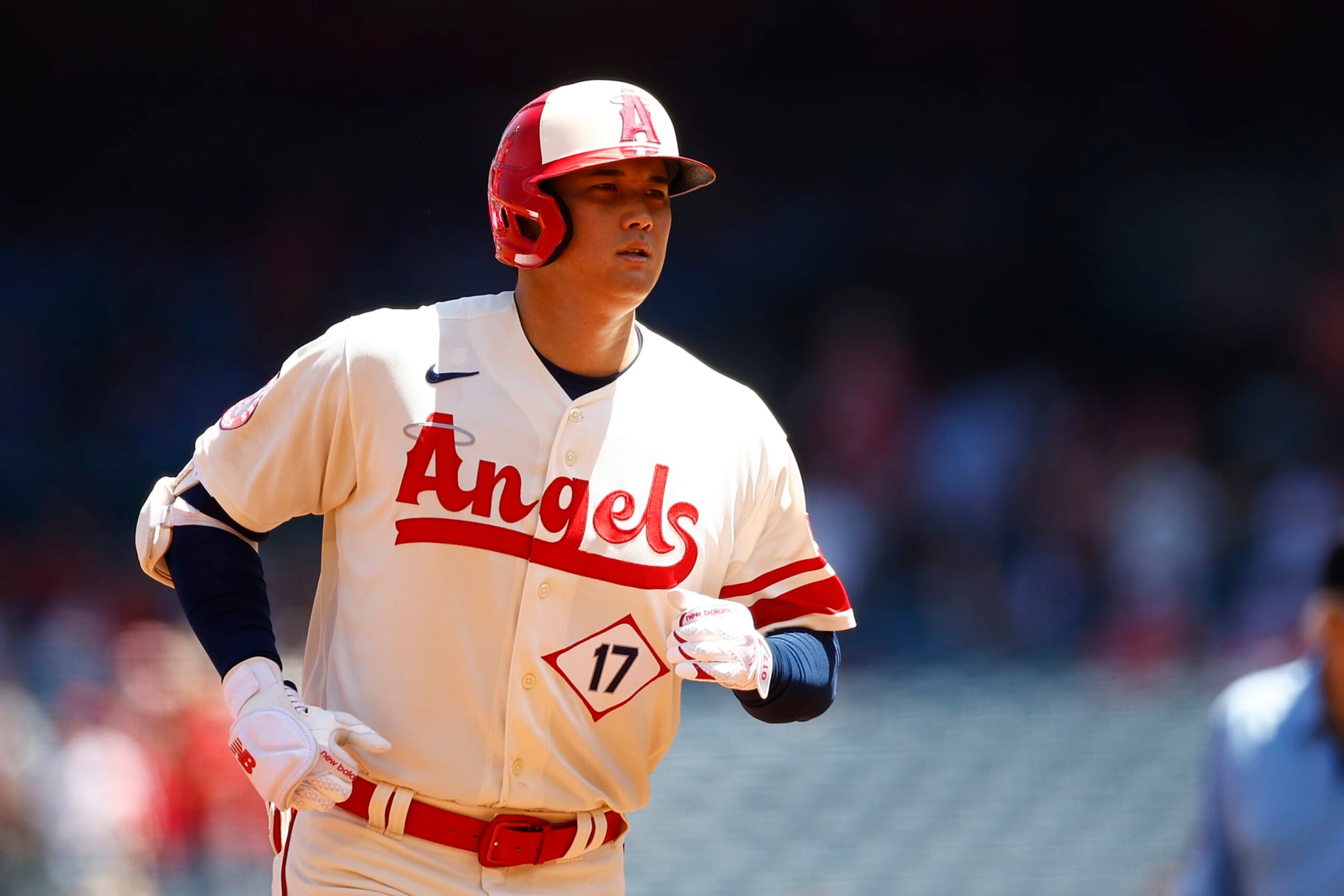 ANAHEIM, CALIFORNIA - AUGUST 23:  Shohei Ohtani #17 of the Los Angeles Angels hits a two-run home run against the Cincinnati Reds in the first inning during game one of a doubleheader at Angel Stadium of Anaheim on August 23, 2023 in Anaheim, California. (Photo by Ronald Martinez/Getty Images)