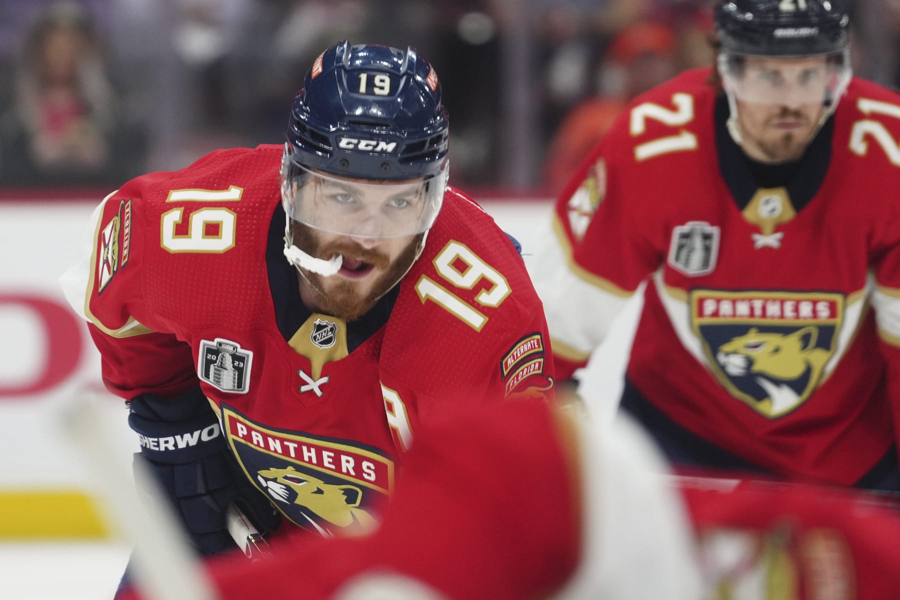SUNRISE, FL - JUNE 08: Florida Panthers left wing Matthew Tkachuk (19) and Florida Panthers center Nick Cousins (21) wait for a face-off in the second period during game three of the Stanley Cup Final between the Vegas Golden Knights and the Florida Panthers on Thursday, June 8, 2023 at FLA Live Arena, Sunrise, Fla. (Photo by Peter Joneleit/Icon Sportswire via Getty Images)
