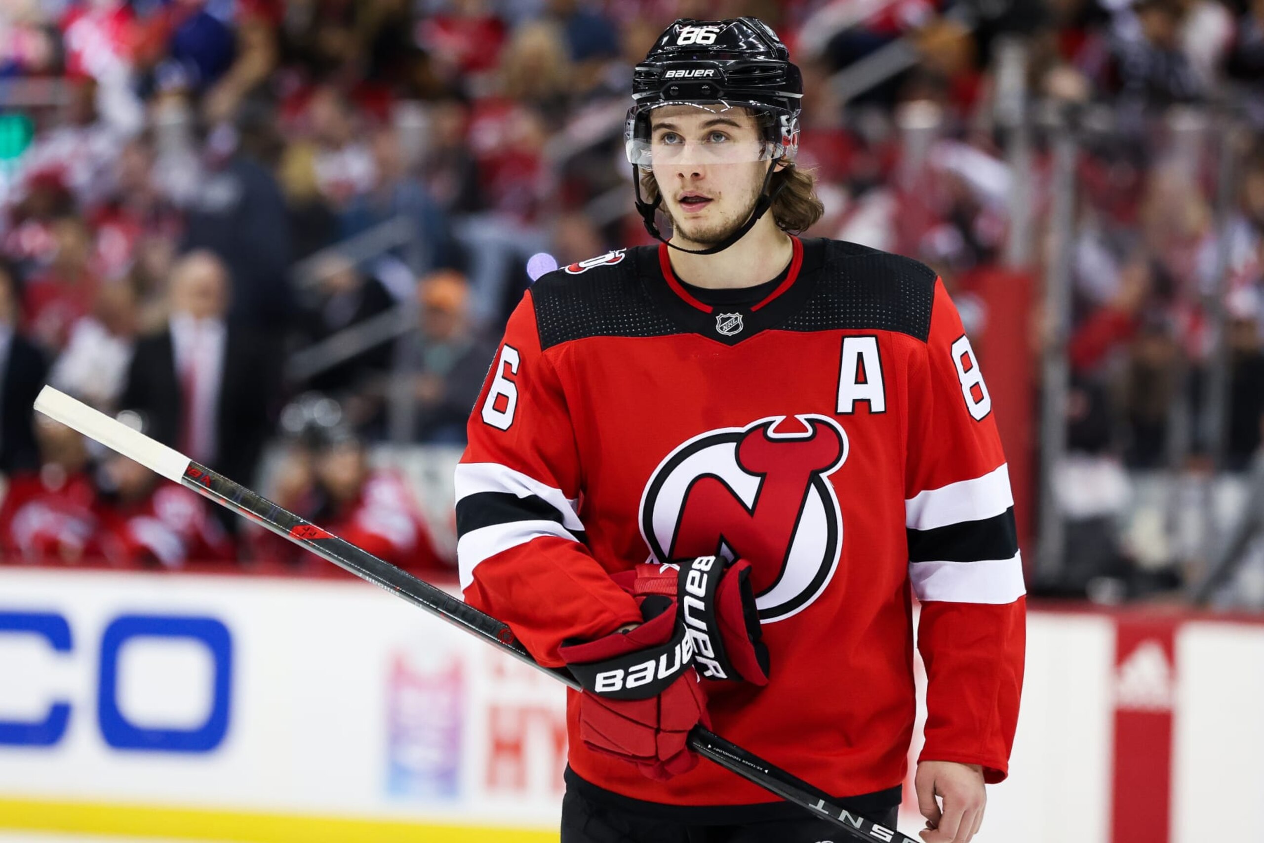 NEWARK, NJ - MAY 09: New Jersey Devils center Jack Hughes (86) looks on during Game 4 of an Eastern Conference Second Round playoff game between the Carolina Hurricanes and the New Jersey Devils on May 9, 2023, at Prudential Center in Newark, New Jersey. (Photo by Andrew Mordzynski/Icon Sportswire via Getty Images) NEWARK, NJ - MAY 09: New Jersey Devils center Jack Hughes (86) looks on during Game 4 of an Eastern Conference Second Round playoff game between the Carolina Hurricanes and the New Jersey Devils on May 9, 2023, at Prudential Center in Newark, New Jersey. (Photo by Andrew Mordzynski/Icon Sportswire via Getty Images)