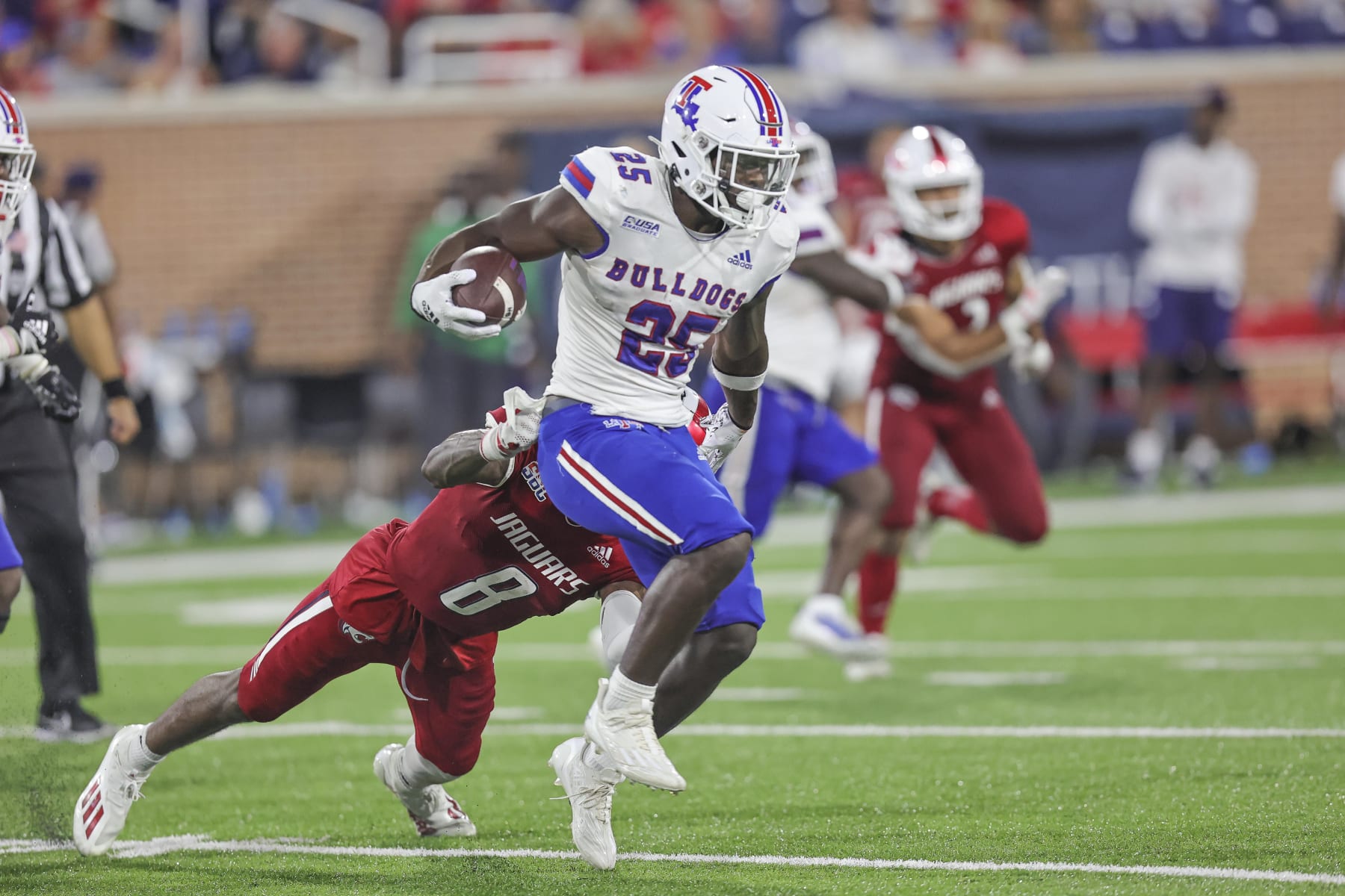 MOBILE, AL - SEPTEMBER 24: Louisiana Tech Bulldogs running back Greg Garner (25) carries the ball during a college football game between the Louisiana Tech Bulldogs and the South Alabama Jaguars at Hancock-Whitney Stadium, in Mobile, AL. (Photo by Bobby McDuffie/Icon Sportswire via Getty Images)