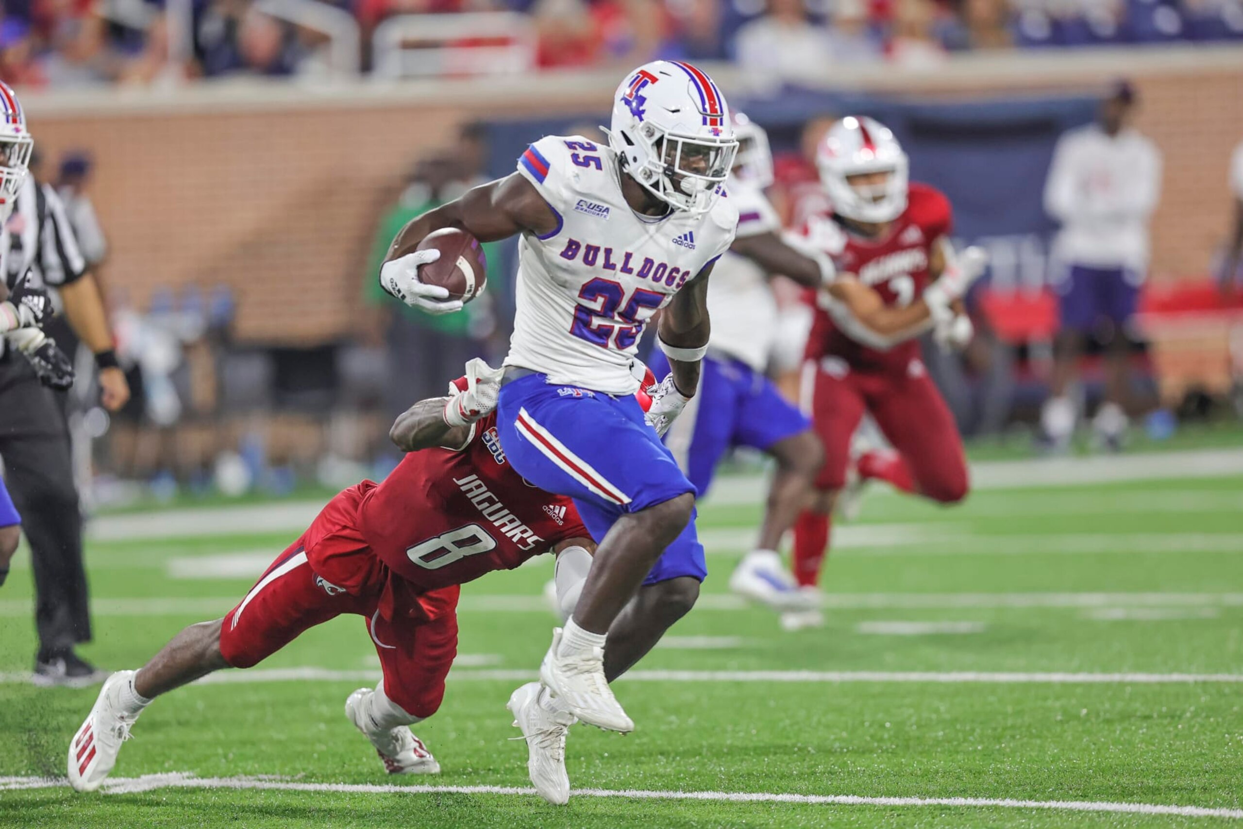 MOBILE, AL - SEPTEMBER 24: Louisiana Tech Bulldogs running back Greg Garner (25) carries the ball during a college football game between the Louisiana Tech Bulldogs and the South Alabama Jaguars at Hancock-Whitney Stadium, in Mobile, AL. (Photo by Bobby McDuffie/Icon Sportswire via Getty Images)