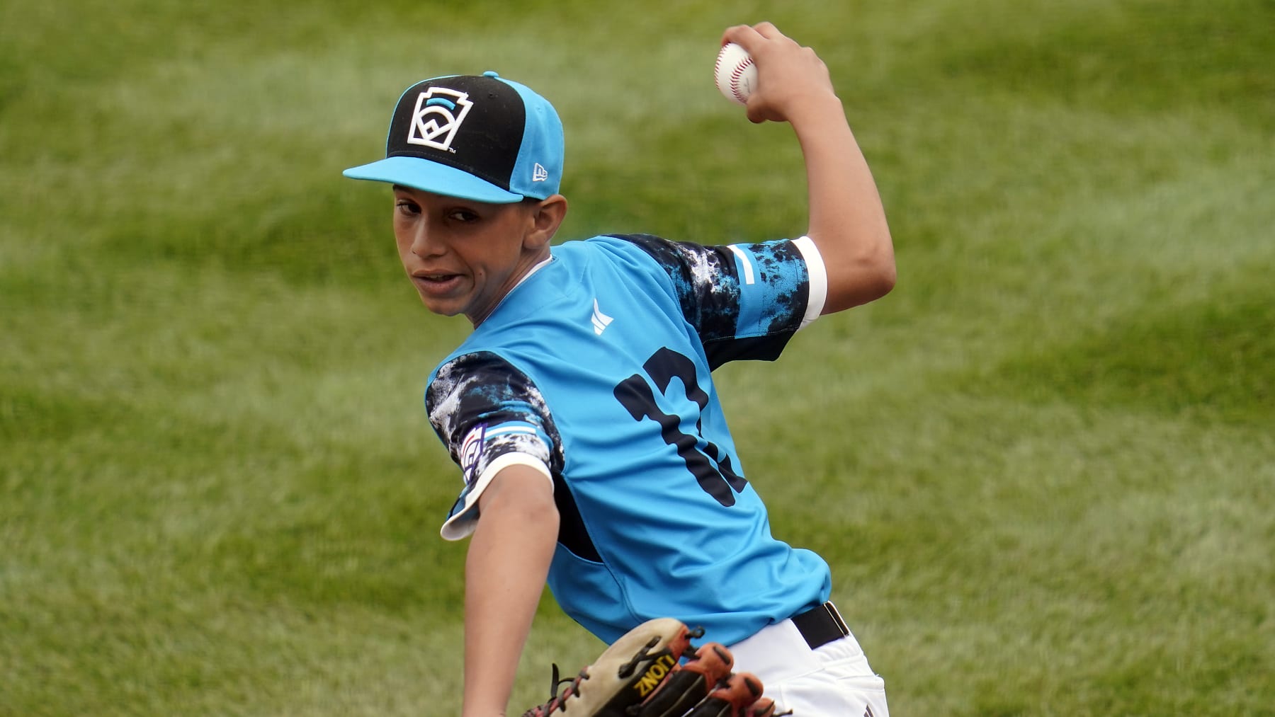 Taiwan starting pitcher Cai Yuan-Hao (8) delivers a pitch against Curacao during the first inning of a baseball game at the Little League World Series tournament in South Williamsport, Pa., Wednesday, Aug. 23, 2023. (AP Photo/Tom E. Puskar)