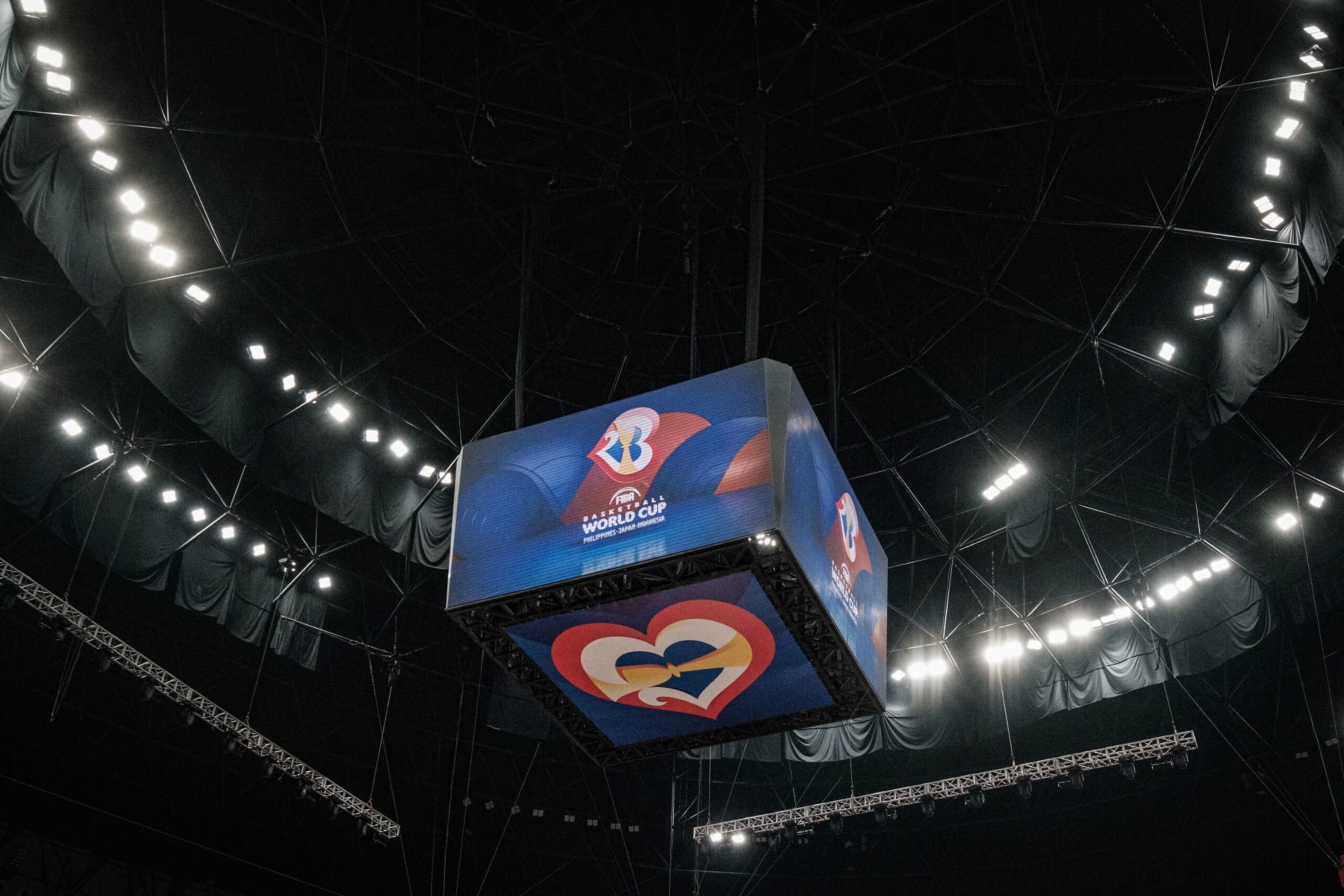Screens show the logo of the FIBA Basketball World Cup during a training session at Indonesia Arena in Jakarta on August 24, 2023. (Photo by Yasuyoshi CHIBA / AFP) (Photo by YASUYOSHI CHIBA/AFP via Getty Images)