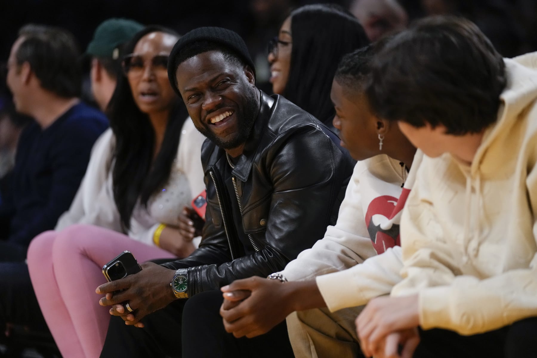 Comedian Kevin Hart sits in the front row during the first half of an NBA basketball game between the Memphis Grizzlies and the Los Angeles Lakers in Los Angeles, Friday, Jan. 20, 2023. (AP Photo/Ashley Landis)