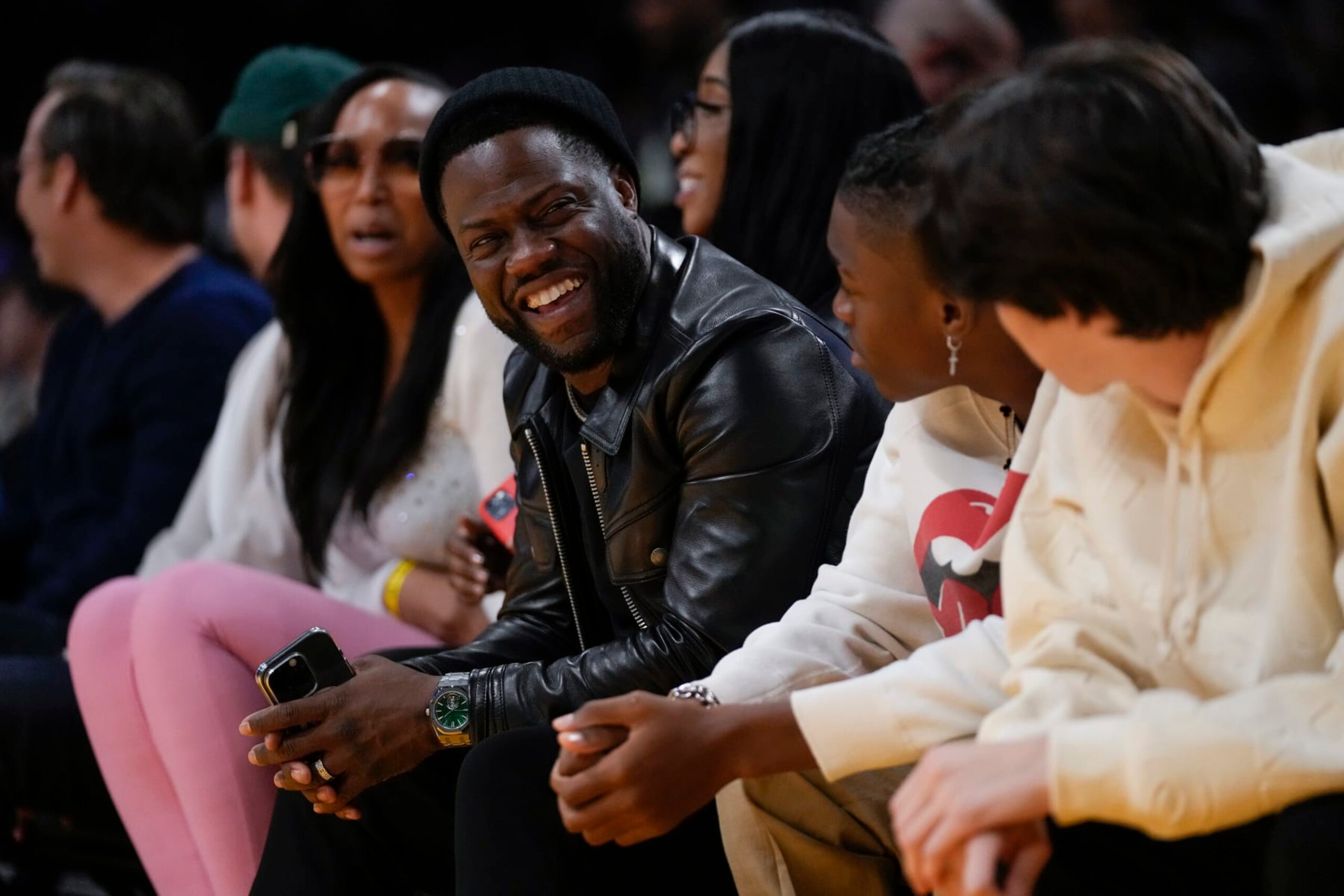 Comedian Kevin Hart sits in the front row during the first half of an NBA basketball game between the Memphis Grizzlies and the Los Angeles Lakers in Los Angeles, Friday, Jan. 20, 2023. (AP Photo/Ashley Landis)