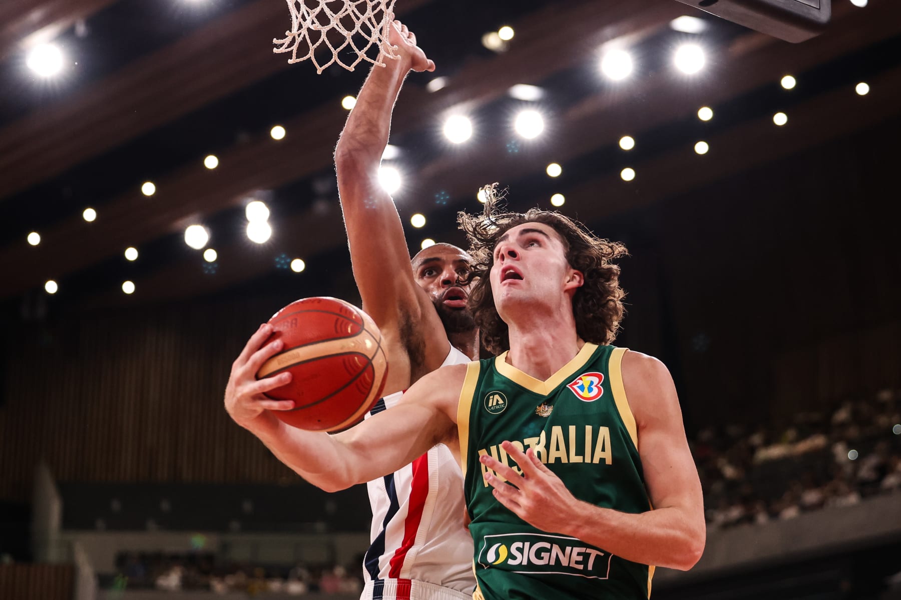 TOKYO, JAPAN - AUGUST 20: Josh Giddey #3 of Australia drives to the basket during the international basketball game between France and Australia at Ariake Arena on August 20, 2023 in Tokyo, Japan. (Photo by Takashi Aoyama/Getty Images)