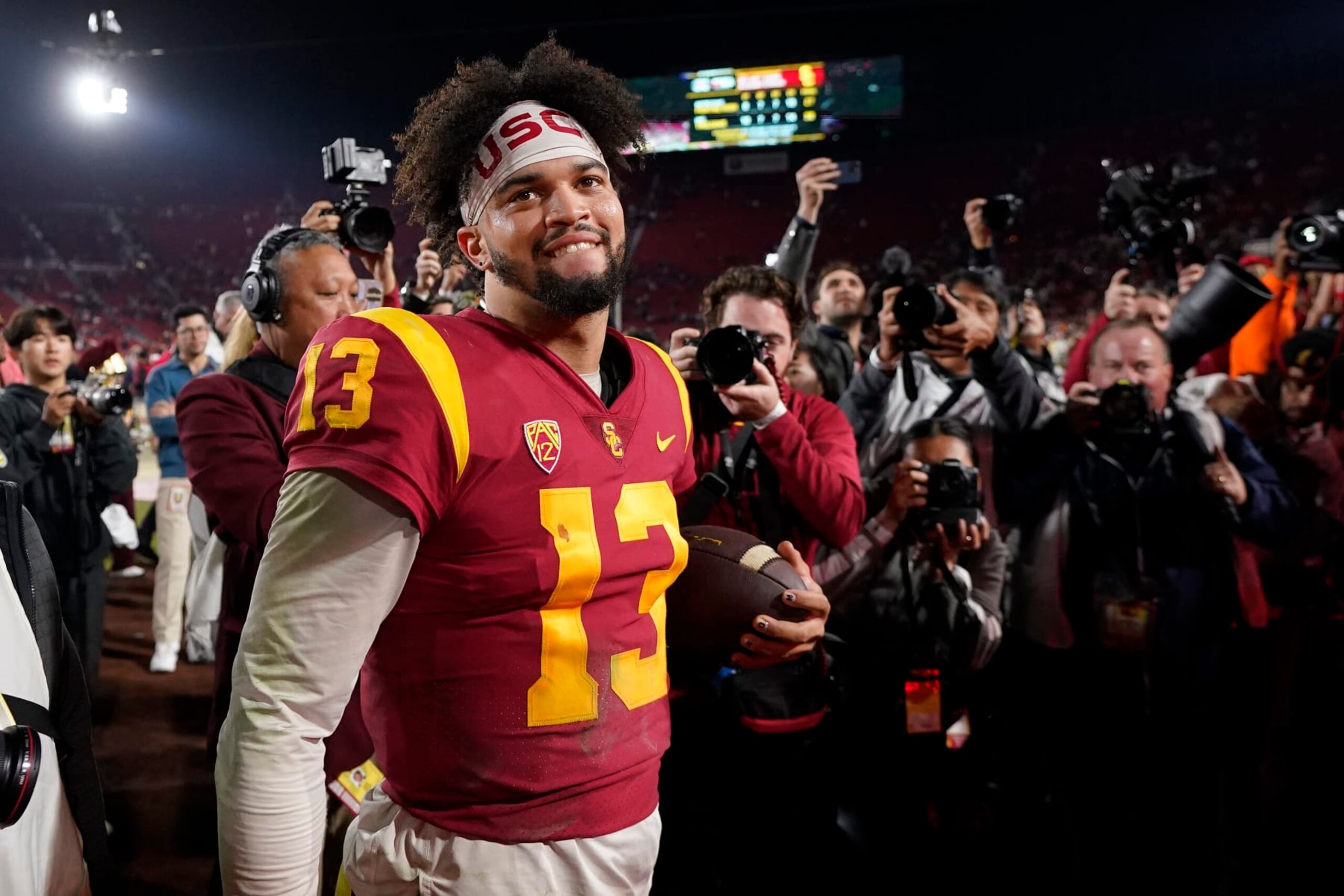Southern California quarterback Caleb Williams smiles after USC defeated Notre Dame 38-27 an NCAA college football game Saturday, Nov. 26, 2022, in Los Angeles. (AP Photo/Mark J. Terrill)