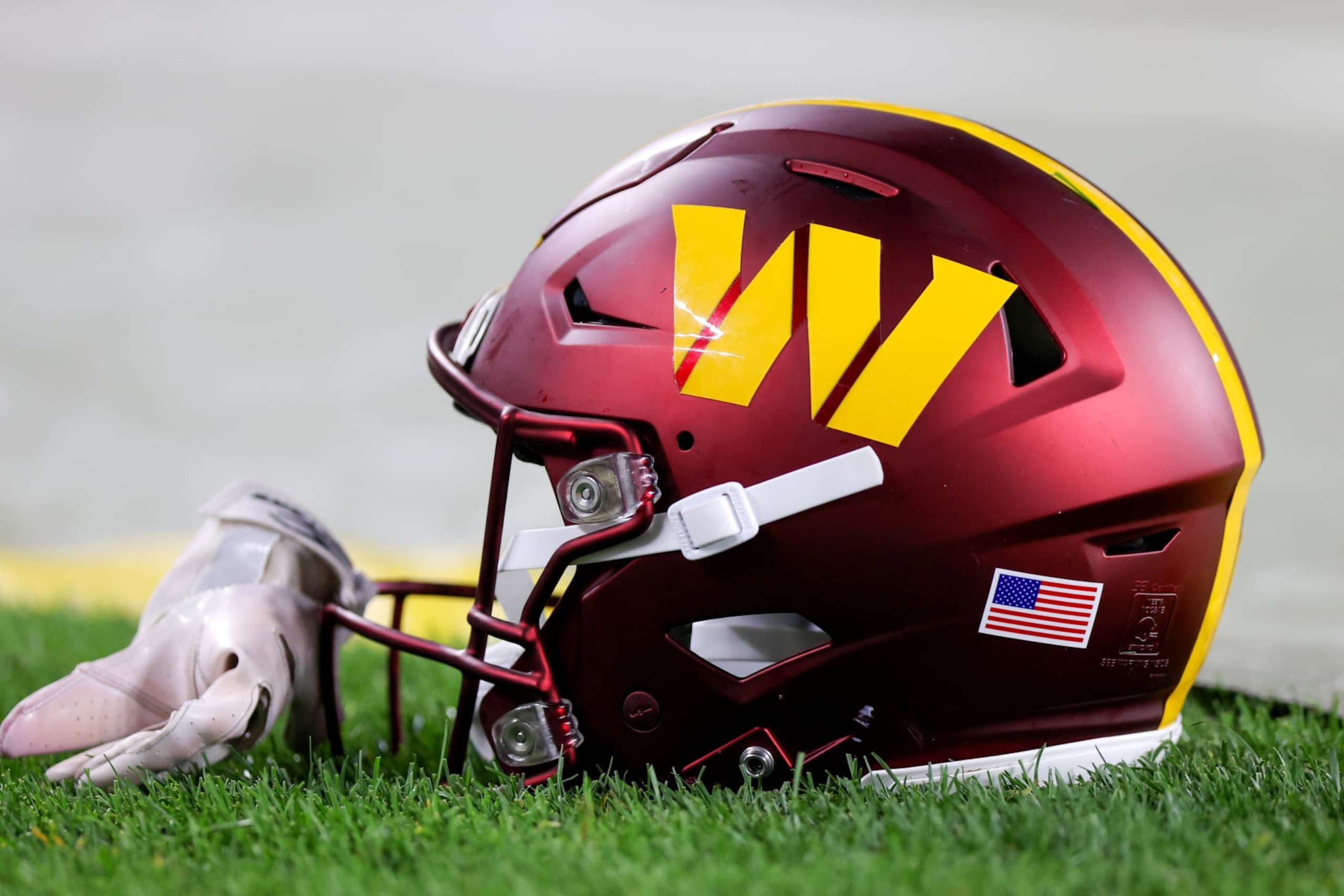 CLEVELAND, OH - AUGUST 11: A Washington Commanders helmet on the sideline during the fourth quarter of the National Football League preseason game between the Washington Commanders and Cleveland Browns on August 11, 2023, at Cleveland Browns Stadium in Cleveland, OH. (Photo by Frank Jansky/Icon Sportswire via Getty Images)