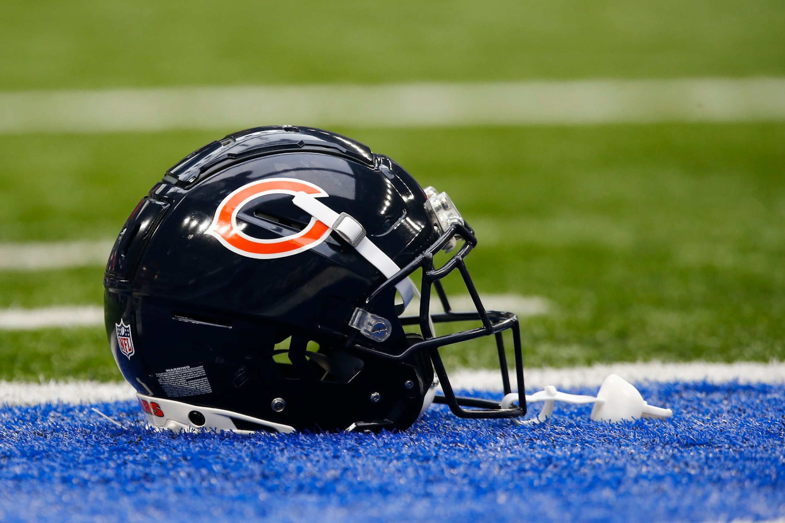INDIANAPOLIS, IN - AUGUST 19: A Chicago Bears helmet sits on the turf prior to the start of a preseason game between the Chicago Bears and the Indianapolis Colts on August 19, 2023 at Lucas Oil Stadium in Indianapolis, IN. (Photo by Jeffrey Brown/Icon Sportswire via Getty Images)