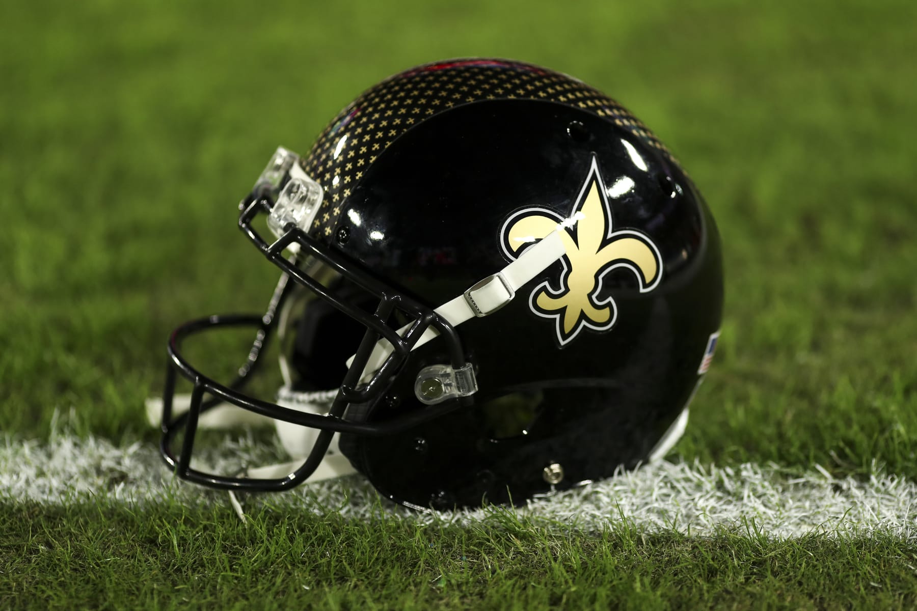 TAMPA, FL - DECEMBER 5: A black alternate New Orleans Saints helmet is on the field prior to an NFL football game against the Tampa Bay Buccaneers at Raymond James Stadium on December 5, 2022 in Tampa, Florida. (Photo by Kevin Sabitus/Getty Images)
