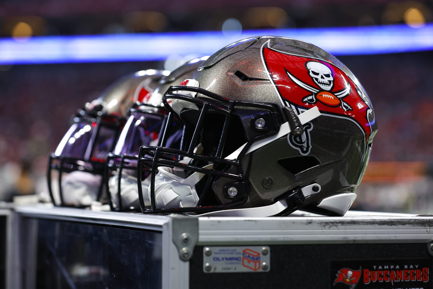 ATLANTA, GA - JANUARY 08: Tampa Bay Buccaneers helmets sit atop an equipment case during the first half against the Atlanta Falcons at Mercedes-Benz Stadium on January 8, 2023 in Atlanta, Georgia. (Photo by Todd Kirkland/Getty Images)