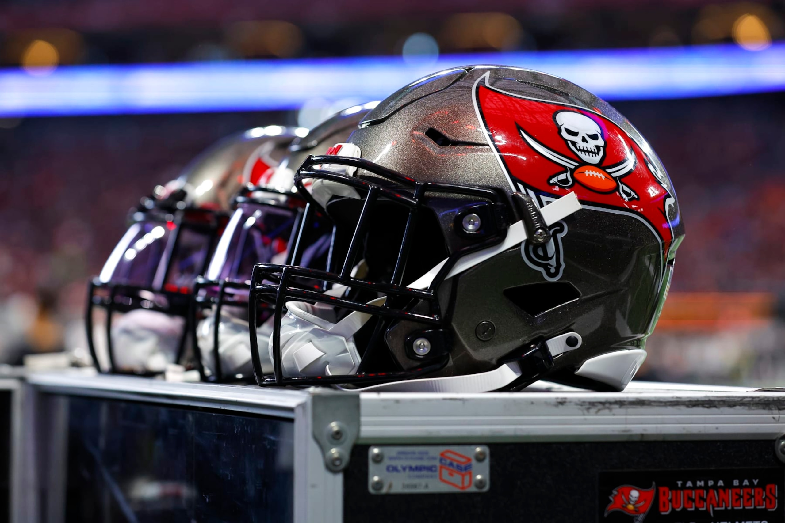 ATLANTA, GA - JANUARY 08: Tampa Bay Buccaneers helmets sit atop an equipment case during the first half against the Atlanta Falcons at Mercedes-Benz Stadium on January 8, 2023 in Atlanta, Georgia. (Photo by Todd Kirkland/Getty Images)