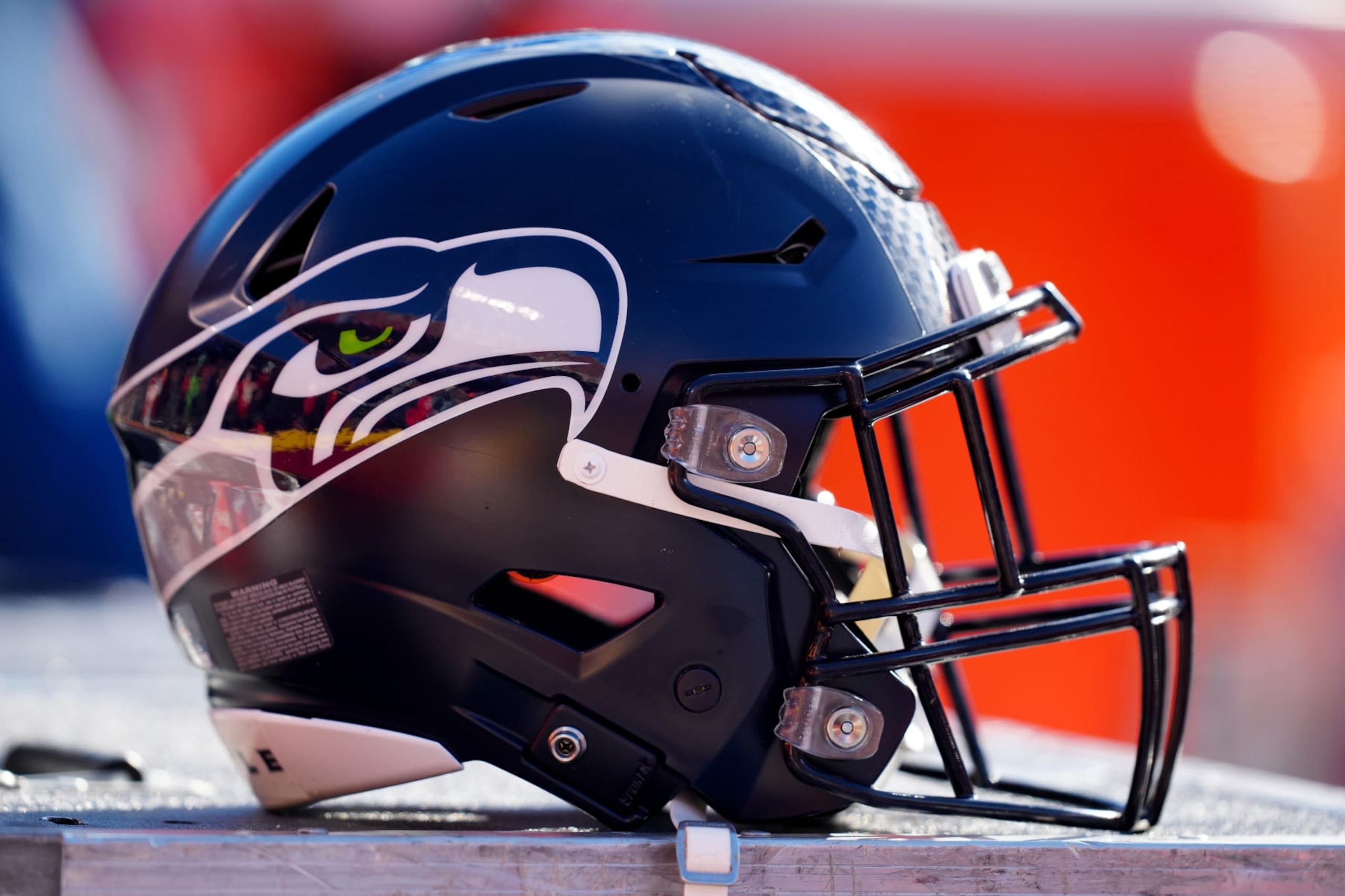 KANSAS CITY, MISSOURI - DECEMBER 24: A Seattle Seahawks helmet sits on the bench during their game against the Kansas City Chiefs at Arrowhead Stadium on December 24, 2022 in Kansas City, Missouri. (Photo by Jason Hanna/Getty Images)