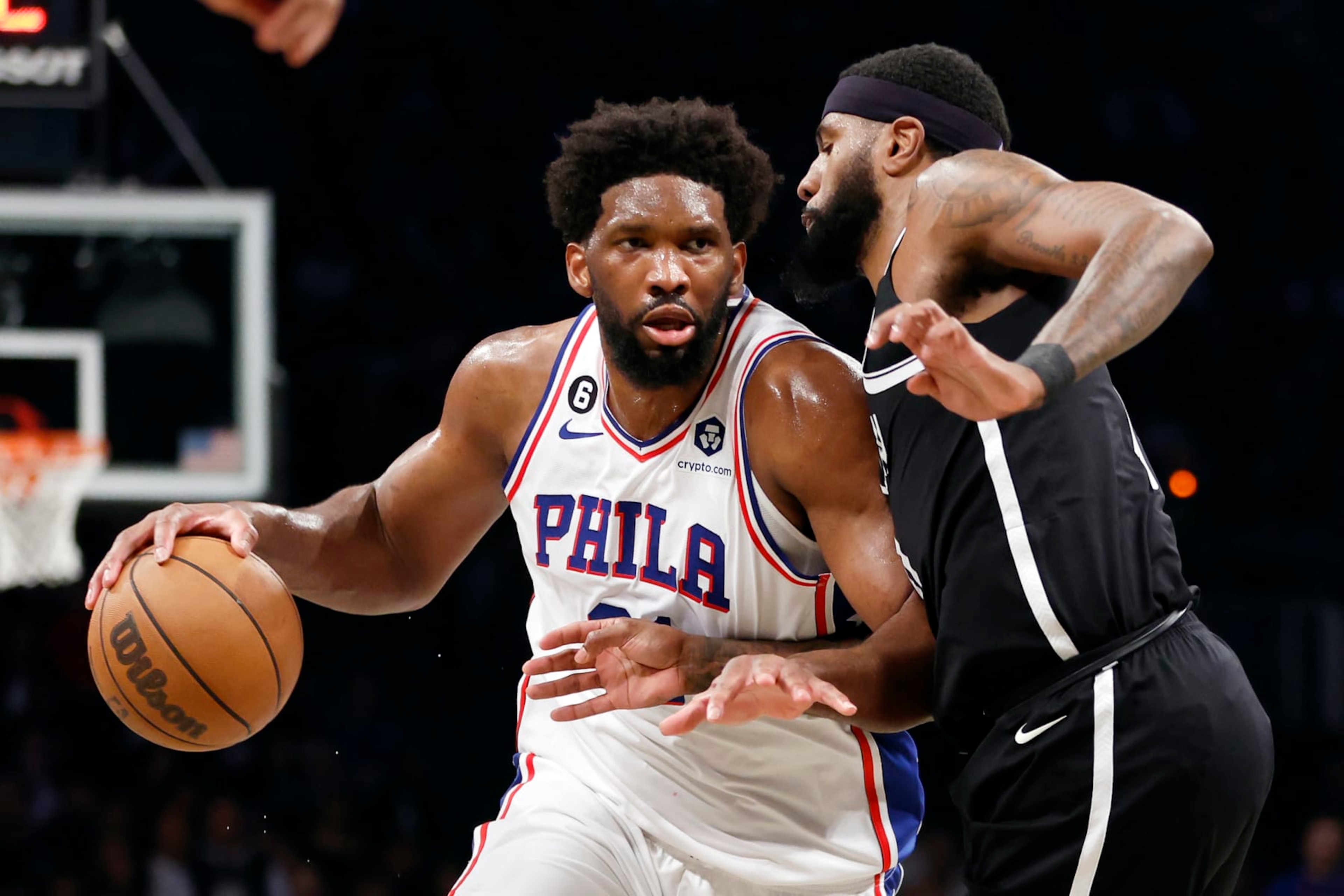 NEW YORK, NEW YORK - APRIL 20: Joel Embiid #21 of the Philadelphia 76ers dribbles against Royce O'Neale #00 of the Brooklyn Nets during the second half of Game Three of the Eastern Conference First Round Playoffs at Barclays Center on April 20, 2023 in the Brooklyn borough of New York City. The 76ers won 102-97. NOTE TO USER: User expressly acknowledges and agrees that, by downloading and or using this photograph, User is consenting to the terms and conditions of the Getty Images License Agreement. (Photo by Sarah Stier/Getty Images) NEW YORK, NEW YORK - APRIL 20: Joel Embiid #21 of the Philadelphia 76ers dribbles against Royce O'Neale #00 of the Brooklyn Nets during the second half of Game Three of the Eastern Conference First Round Playoffs at Barclays Center on April 20, 2023 in the Brooklyn borough of New York City. The 76ers won 102-97. NOTE TO USER: User expressly acknowledges and agrees that, by downloading and or using this photograph, User is consenting to the terms and conditions of the Getty Images License Agreement. (Photo by Sarah Stier/Getty Images)