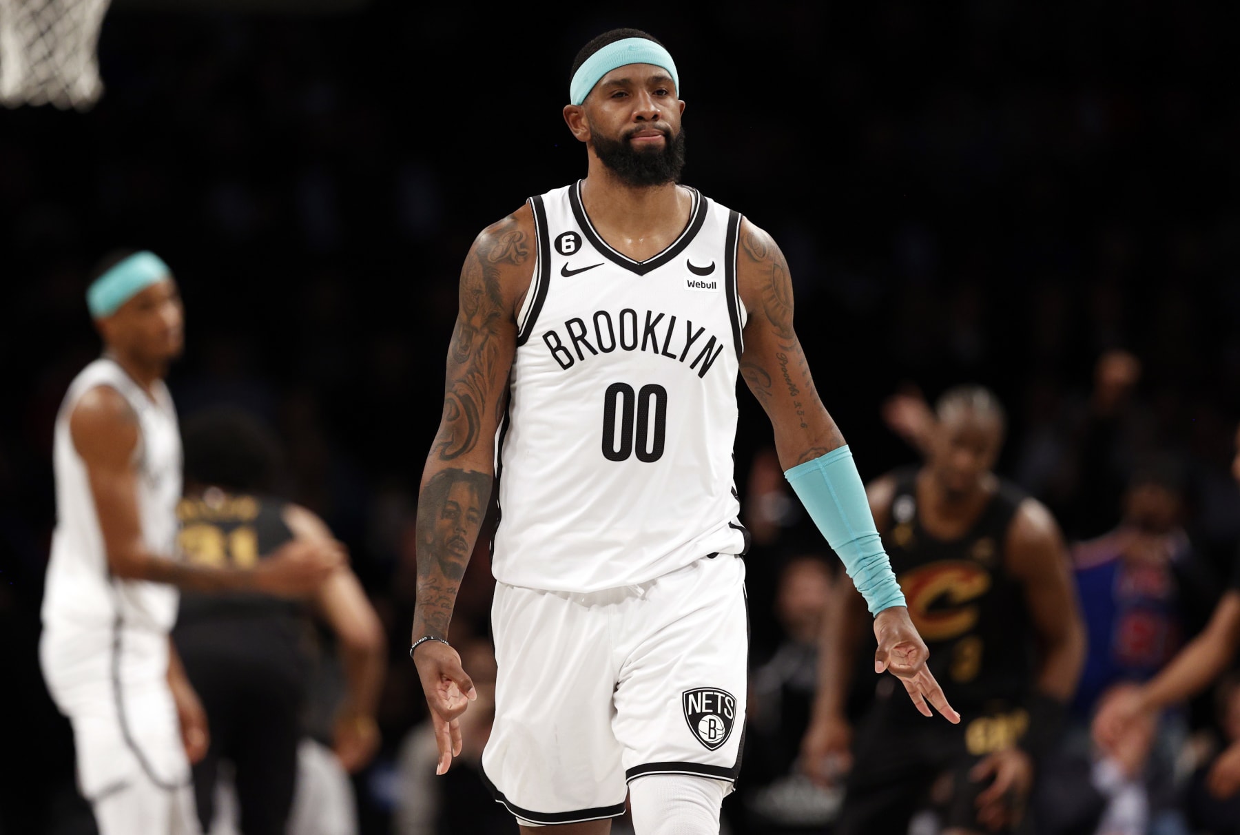 NEW YORK, NEW YORK - MARCH 23: Royce O'Neale #00 of the Brooklyn Nets reacts after making a three-point shot during the second half against the Cleveland Cavaliers at Barclays Center on March 23, 2023 in the Brooklyn borough of New York City. The Cavaliers won 116-114. NOTE TO USER: User expressly acknowledges and agrees that, by downloading and/or using this photograph, User is consenting to the terms and conditions of the Getty Images License Agreement. (Photo by Sarah Stier/Getty Images)