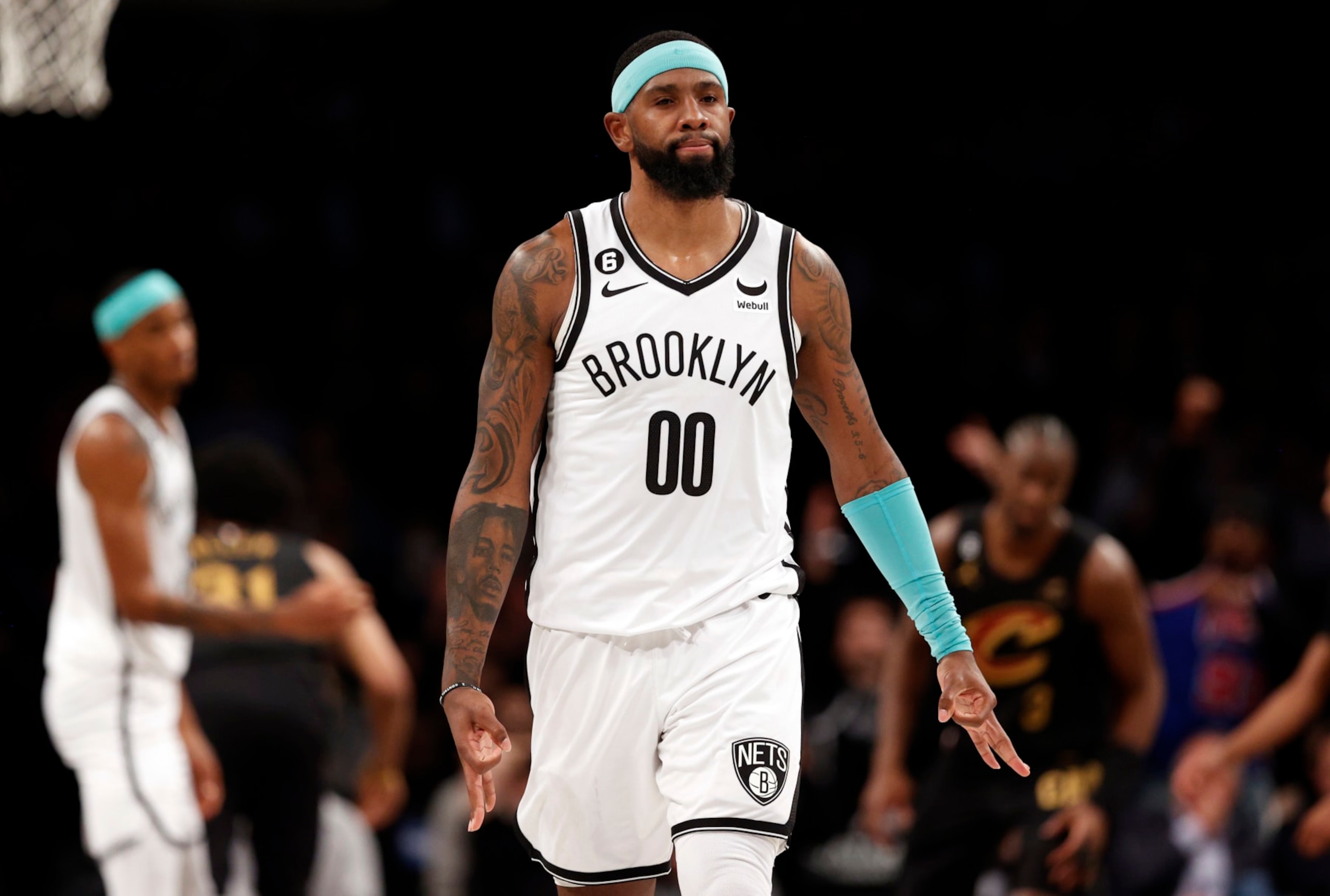 NEW YORK, NEW YORK - MARCH 23: Royce O'Neale #00 of the Brooklyn Nets reacts after making a three-point shot during the second half against the Cleveland Cavaliers at Barclays Center on March 23, 2023 in the Brooklyn borough of New York City. The Cavaliers won 116-114. NOTE TO USER: User expressly acknowledges and agrees that, by downloading and/or using this photograph, User is consenting to the terms and conditions of the Getty Images License Agreement. (Photo by Sarah Stier/Getty Images)