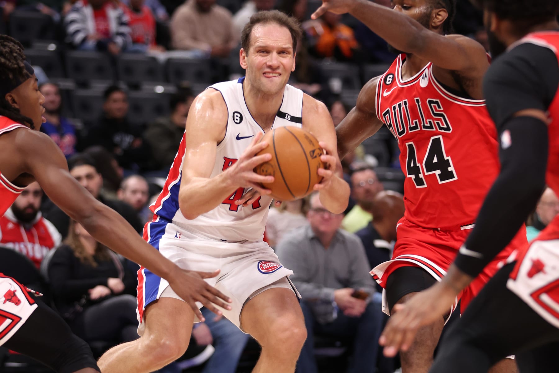 DETROIT, MICHIGAN - MARCH 01: Bojan Bogdanovic #44 of the Detroit Pistons tries to control the ball next to Patrick Williams #44 of the Chicago Bulls during the first half at Little Caesars Arena on March 01, 2023 in Detroit, Michigan. NOTE TO USER: User expressly acknowledges and agrees that, by downloading and or using this photograph, User is consenting to the terms and conditions of the Getty Images License Agreement. (Photo by Gregory Shamus/Getty Images)