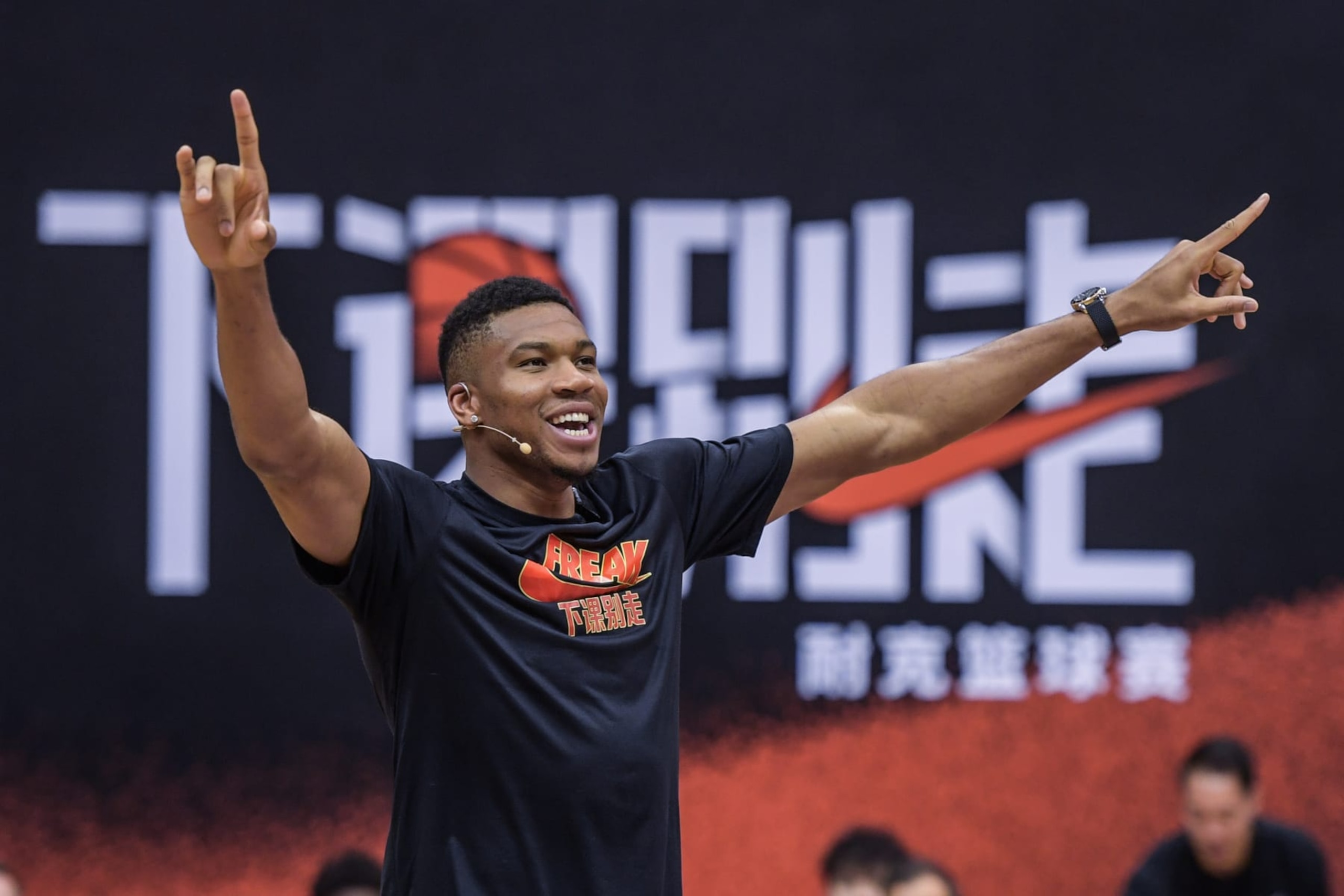BEIJING, CHINA - JULY 09: Giannis Antetokounmpo celebrates with players during the game as part of a promotional event during his visit to China at Beijing Sport University on July 9, 2023 in Beijing, China. (Photo by Di Yin/Getty Images)