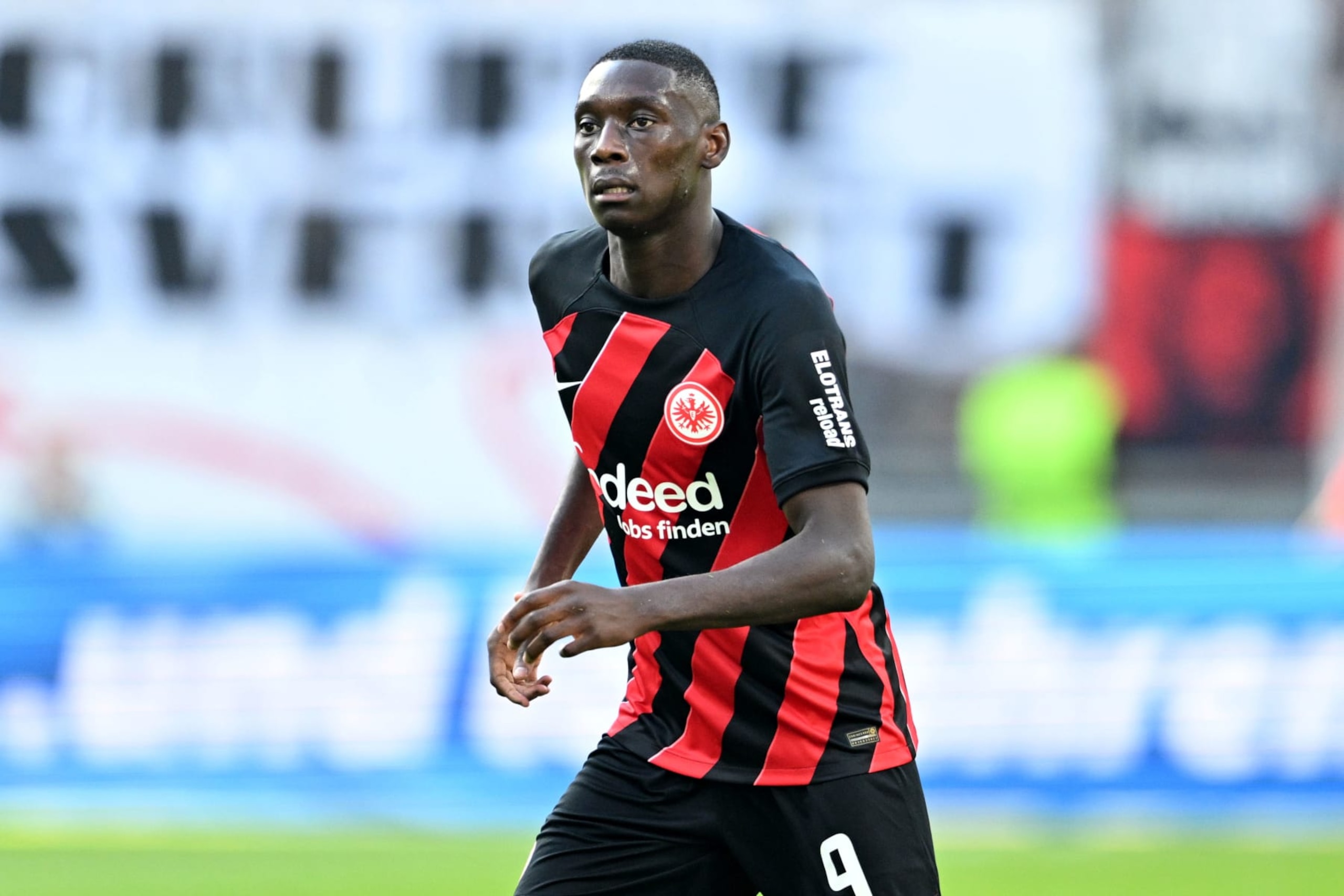 FRANKFURT AM MAIN, GERMANY - AUGUST 20: Randal Kolo Muani of Eintracht Frankfurt looks on during the Bundesliga match between Eintracht Frankfurt and SV Darmstadt 98 at Deutsche Bank Park on August 20, 2023 in Frankfurt am Main, Germany. (Photo by Harry Langer/DeFodi Images via Getty Images)