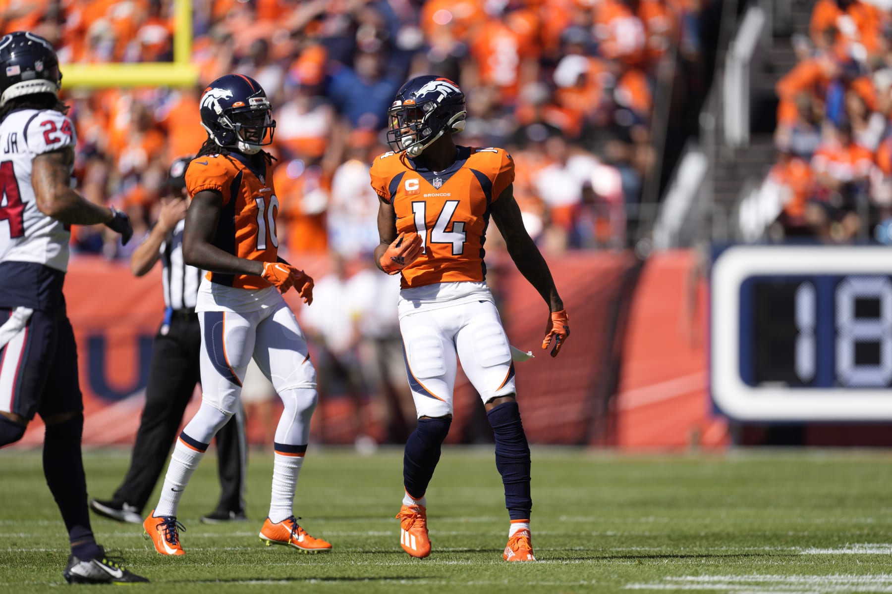 Denver Broncos wide receiver Jerry Jeudy (10) nand Denver Broncos wide receiver Courtland Sutton (14) during an NFL football game Sunday, Sept. 18, 2022, in Denver. (AP Photo/David Zalubowski)