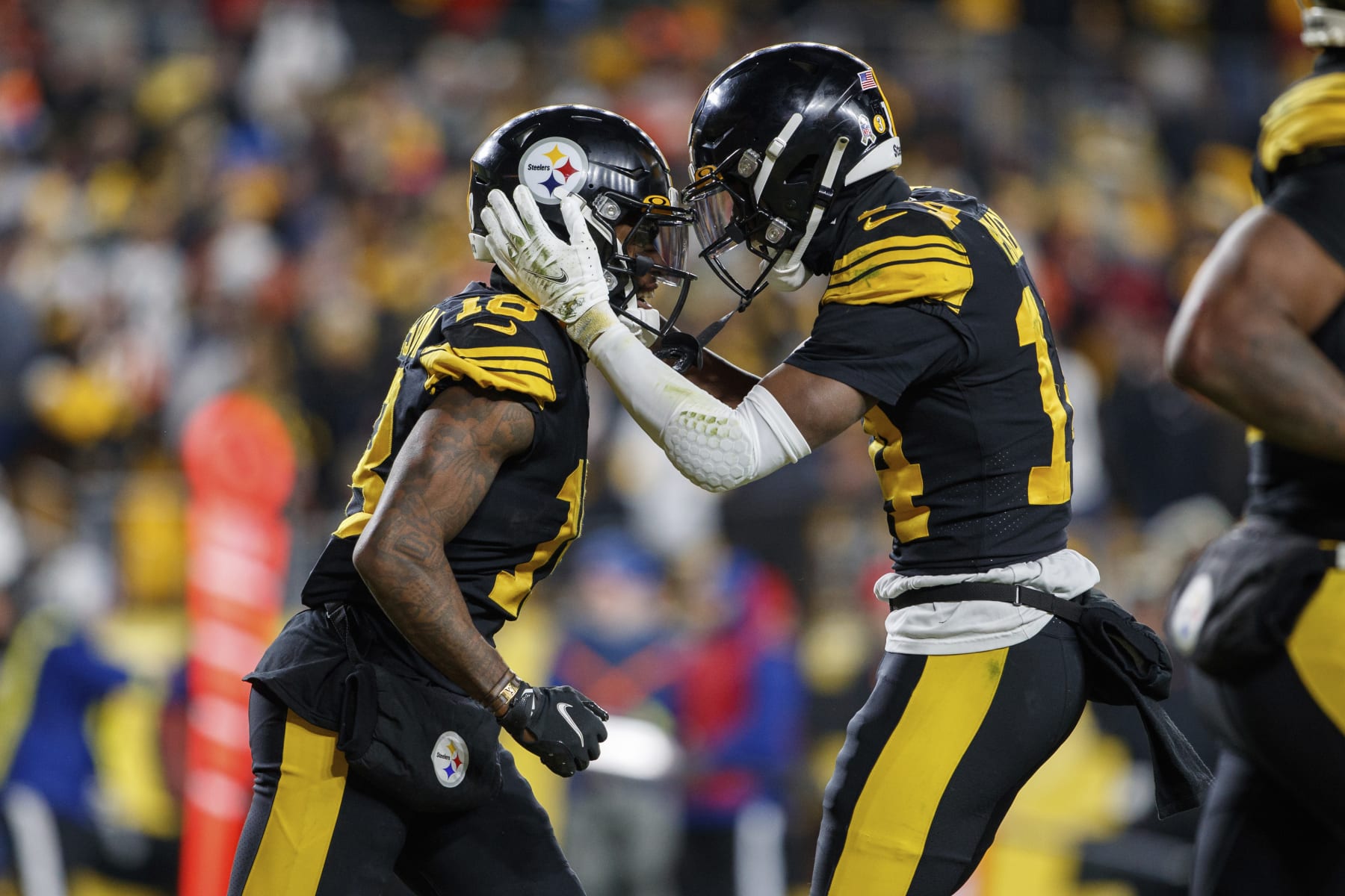 Pittsburgh Steelers wide receiver Diontae Johnson (18) and wide receiver George Pickens (14) celebrate after a touchdown during an NFL football game, Sunday, Nov. 20, 2022, in Pittsburgh, PA. (AP Photo/Matt Durisko)