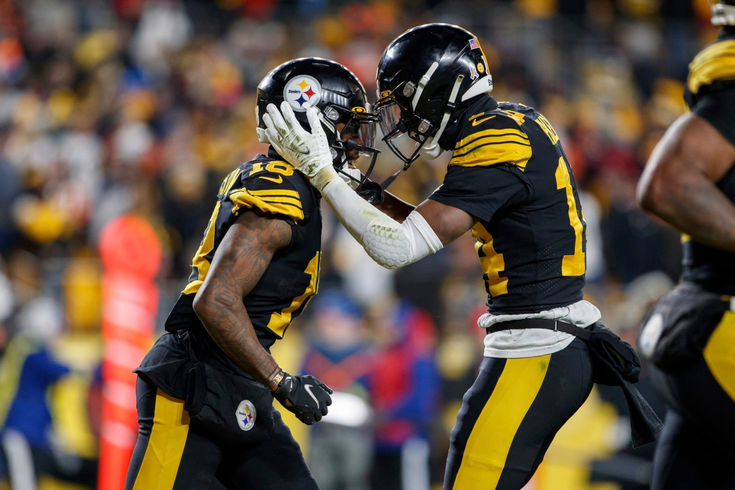 Pittsburgh Steelers wide receiver Diontae Johnson (18) and wide receiver George Pickens (14) celebrate after a touchdown during an NFL football game, Sunday, Nov. 20, 2022, in Pittsburgh, PA. (AP Photo/Matt Durisko)