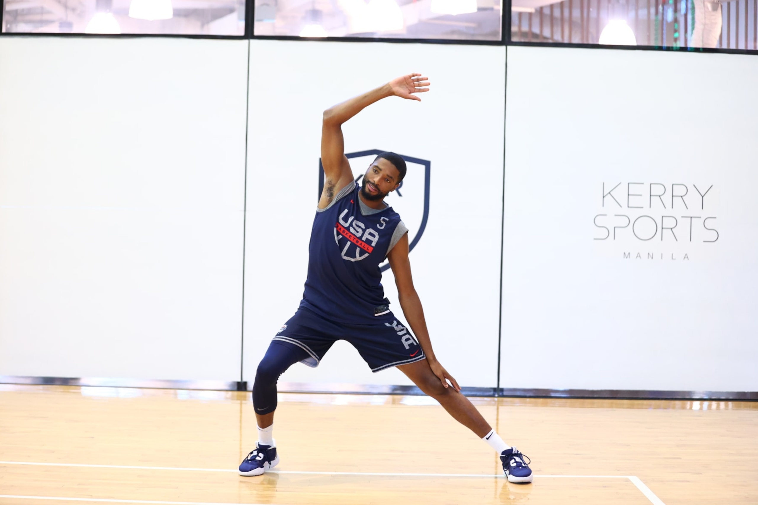 MANILA, PHILIPPINES - AUGUST 24: Mikal Bridges of the USA Men's Senior National Team stretches during practice on August 24, 2023 at Kerry Arena in Manila, Philippines. NOTE TO USER: User expressly acknowledges and agrees that, by downloading and/or using this photograph, user is consenting to the terms and conditions of the Getty Images License Agreement. Mandatory Copyright Notice: Copyright 2023 NBAE (Photo by Nathaniel S. Butler/NBAE via Getty Images)