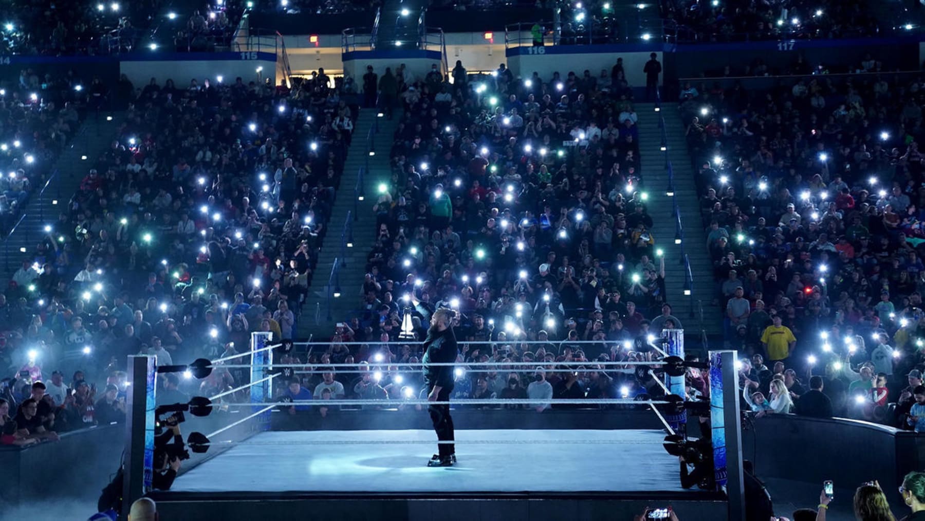 A universe of fireflies paid tribute to the late Bray Wyatt Friday night.