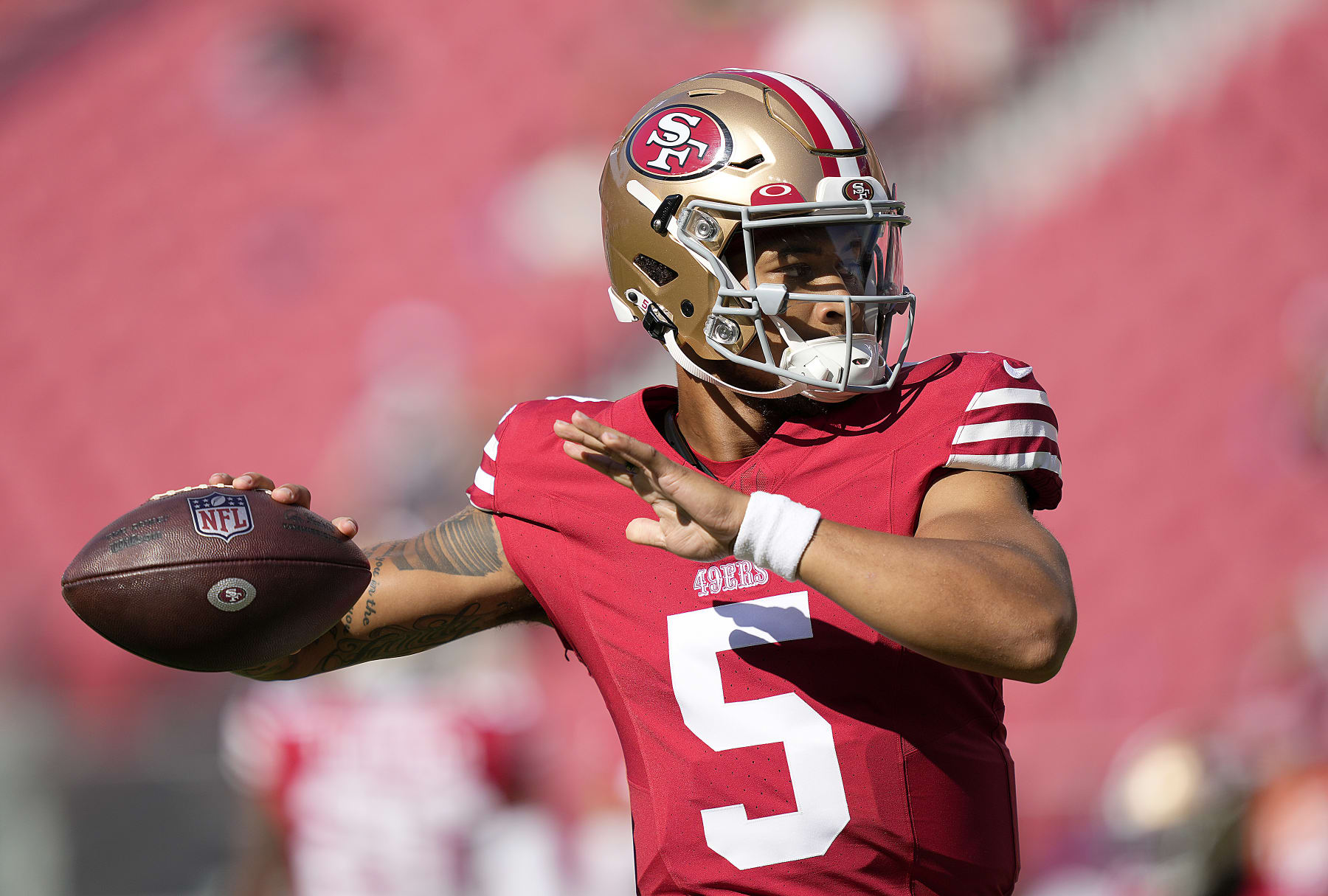 SANTA CLARA, CALIFORNIA - AUGUST 19: Trey Lance #5 of the San Francisco 49ers warms up during pregame warm ups prior to playing the Denver Broncos at Levi's Stadium on August 19, 2023 in Santa Clara, California. (Photo by Thearon W. Henderson/Getty Images)