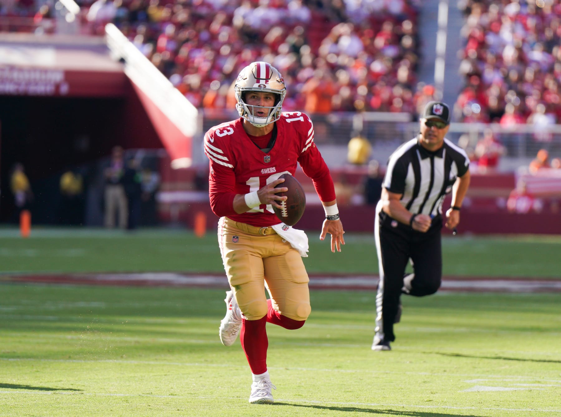 SANTA CLARA, CALIFORNIA - AUGUST 19: Brock Purdy #13 of the San Francisco 49ers scrambles during the first half of a preseason game against the Denver Broncos at Levi's Stadium on August 19, 2023 in Santa Clara, California. (Photo by Loren Elliott/Getty Images)
