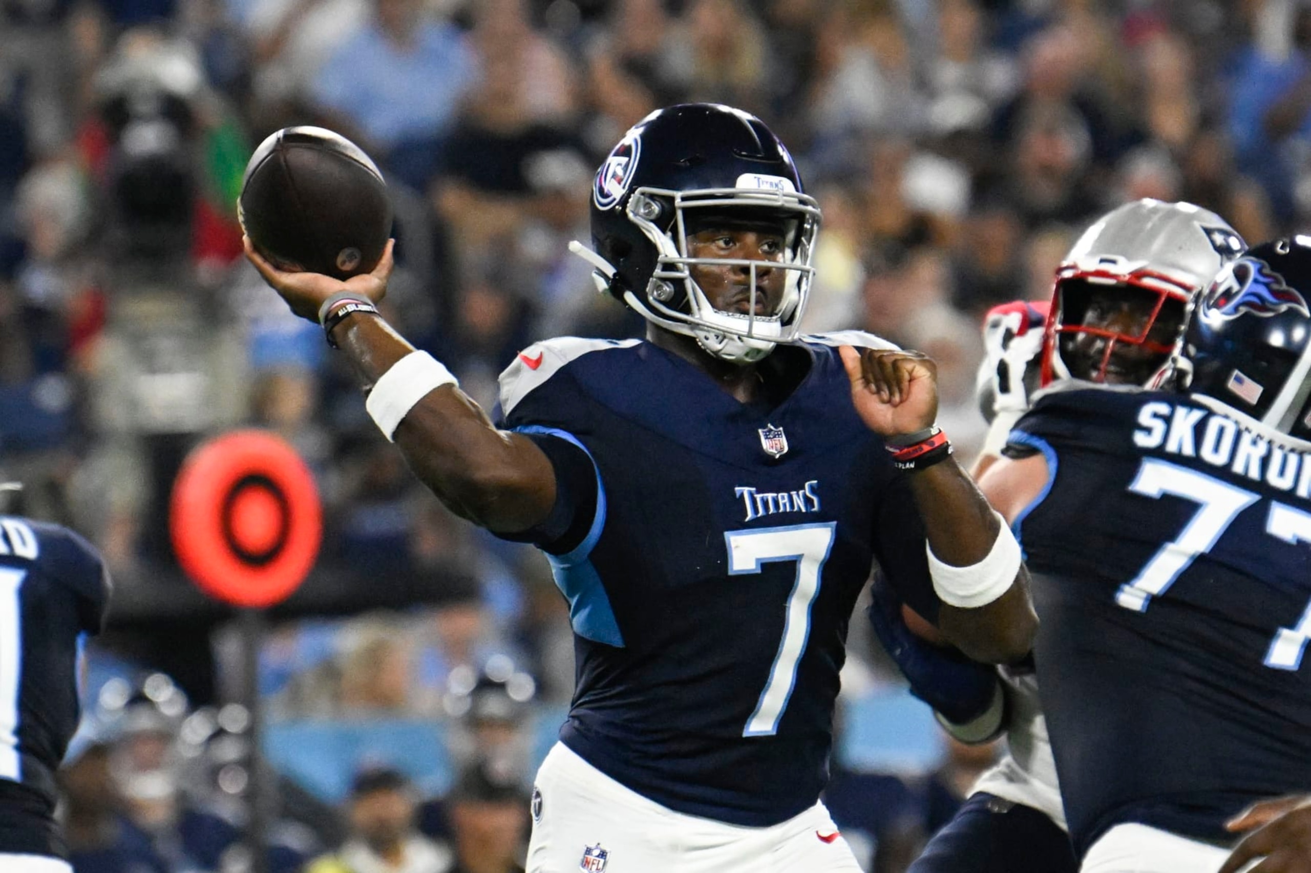 Tennessee Titans quarterback Malik Willis (7) passes in the first half of an NFL preseason football game against the New England Patriots Friday, Aug. 25, 2023, in Nashville, Tenn. (AP Photo/John Amis)
