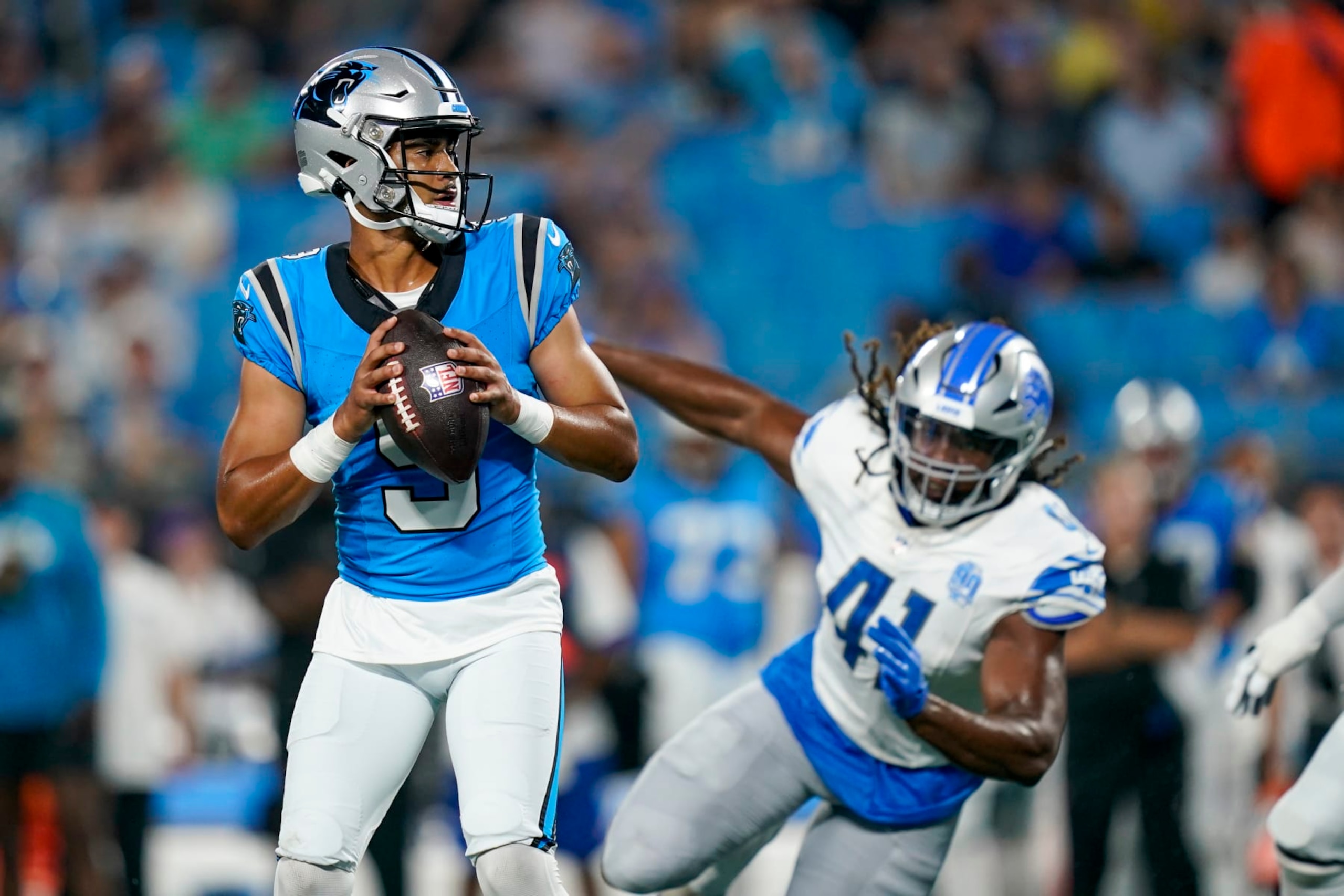Carolina Panthers quarterback Bryce Young looks to pass against the Detroit Lions during the first half of a preseason NFL football game Friday, Aug. 25, 2023, in Charlotte, N.C. (AP Photo/Erik Verduzco)