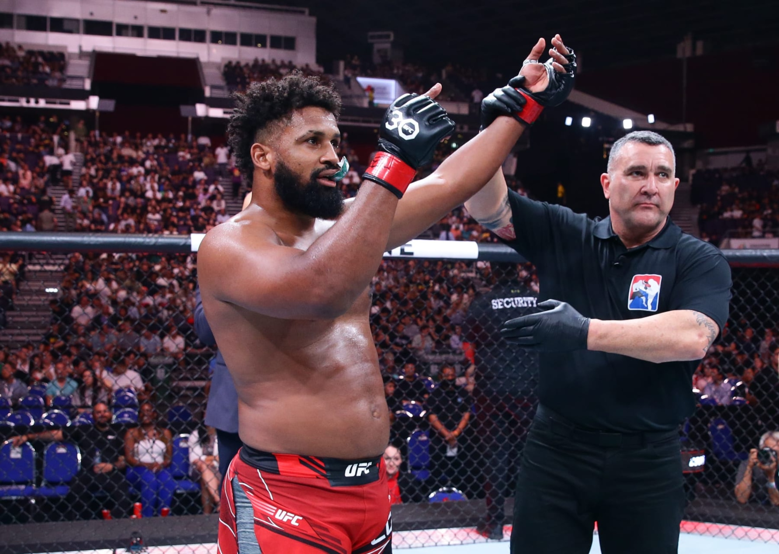 SINGAPORE, SINGAPORE - AUGUST 26: Waldo Cortes-Acosta of the Dominican Republic reacts after his knockout victory over Lukasz Brzeski of Poland in a heavyweight bout during the UFC Fight Night event at Singapore Indoor Stadium on August 26, 2023 in Singapore. (Photo by Suhaimi Abdullah/Zuffa LLC via Getty Images)