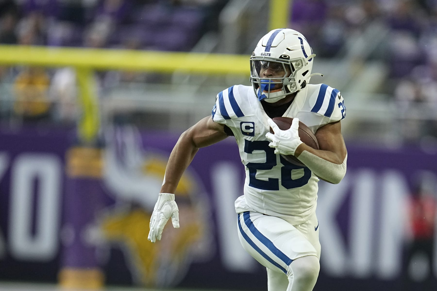 Indianapolis Colts running back Jonathan Taylor runs up field during the first half of an NFL football game against the Minnesota Vikings, Saturday, Dec. 17, 2022, in Minneapolis. (AP Photo/Abbie Parr)