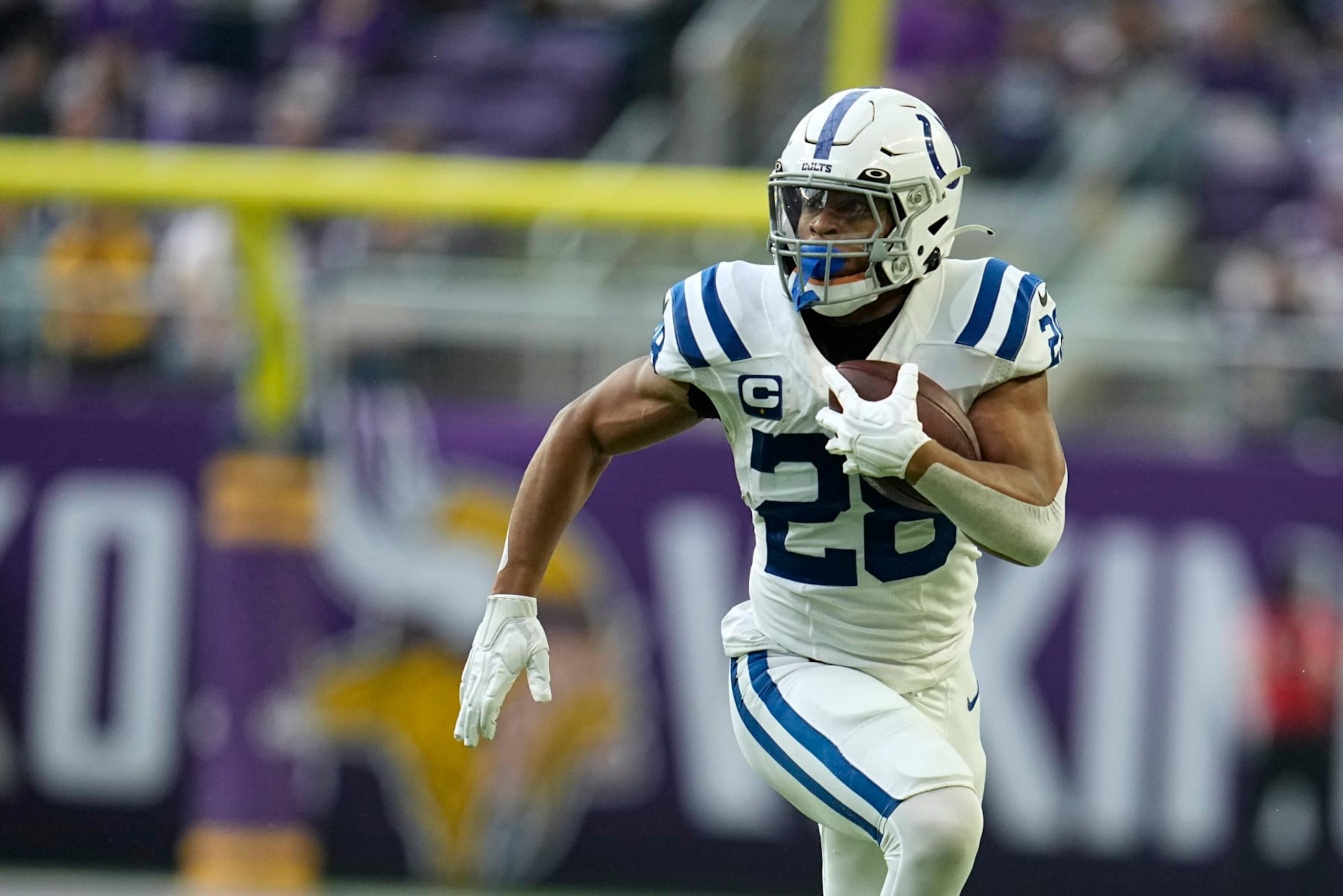 Indianapolis Colts running back Jonathan Taylor runs up field during the first half of an NFL football game against the Minnesota Vikings, Saturday, Dec. 17, 2022, in Minneapolis. (AP Photo/Abbie Parr)