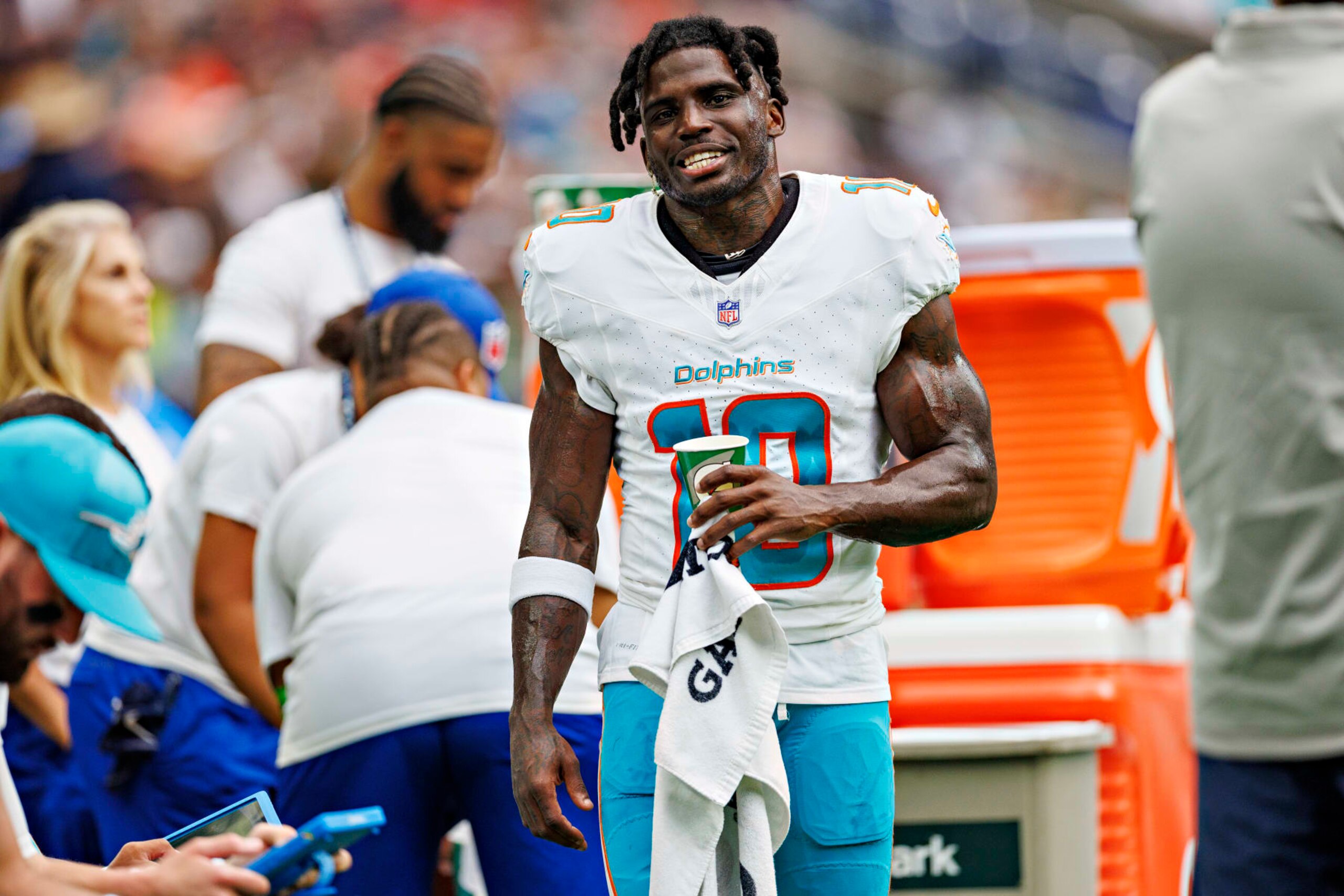 HOUSTON, TEXAS - AUGUST 19: Tyreek Hill #10 of the Miami Dolphins on the sidelines during the preseason game against the Houston Texans at NRG Stadium on August 19, 2023 in Houston, Texas. The Dolphins defeated the Texans 28-3. (Photo by Wesley Hitt/Getty Images) HOUSTON, TEXAS - AUGUST 19: Tyreek Hill #10 of the Miami Dolphins on the sidelines during the preseason game against the Houston Texans at NRG Stadium on August 19, 2023 in Houston, Texas. The Dolphins defeated the Texans 28-3. (Photo by Wesley Hitt/Getty Images)