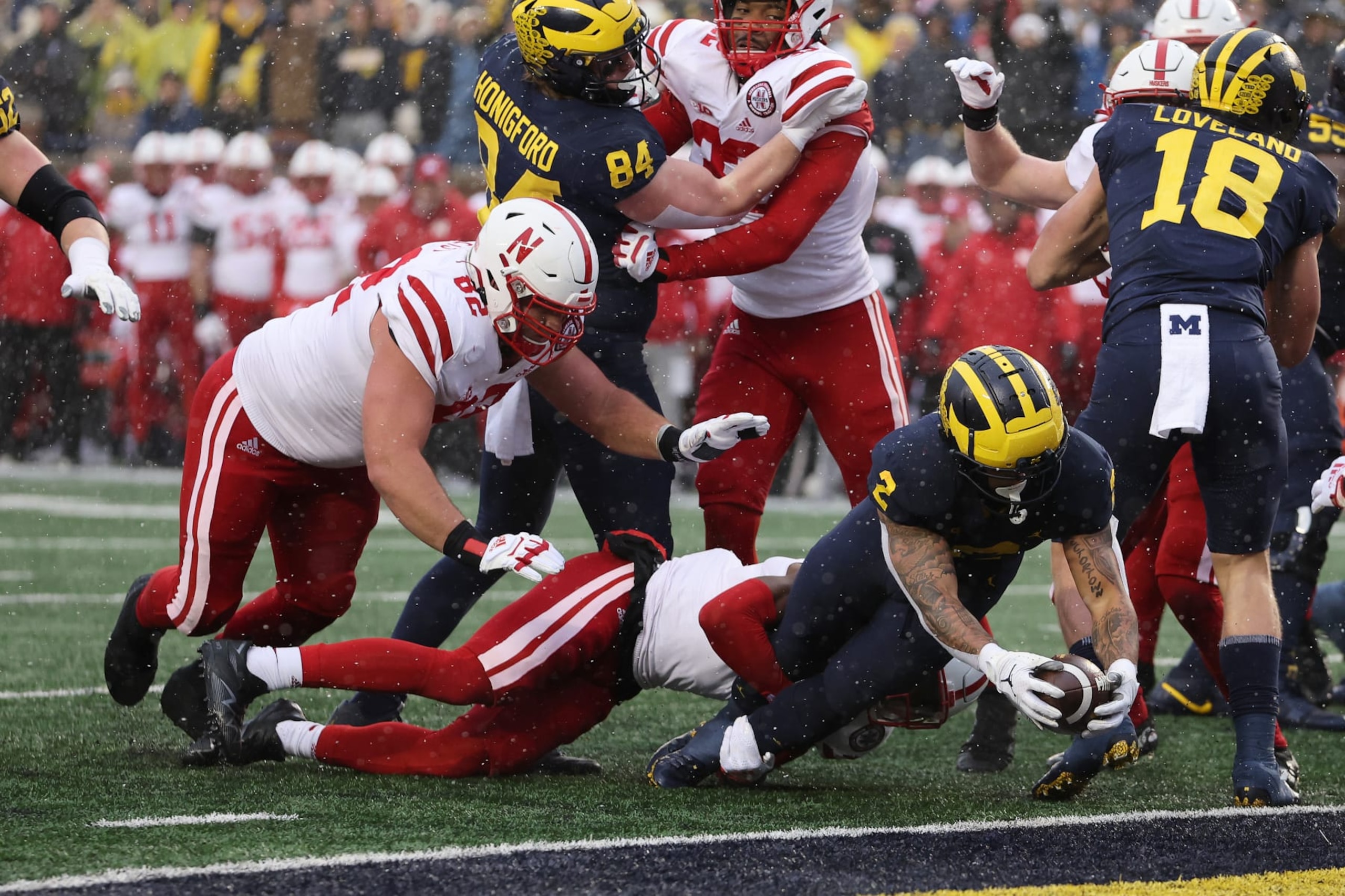 ANN ARBOR, MICHIGAN - NOVEMBER 12: Blake Corum #2 of the Michigan Wolverines dives for a first half touchdown while playing the Nebraska Cornhuskers at Michigan Stadium on November 12, 2022 in Ann Arbor, Michigan. (Photo by Gregory Shamus/Getty Images)