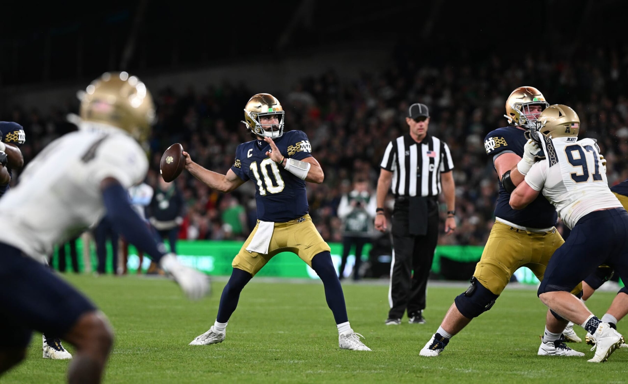 DUBLIN, IRELAND - AUGUST 26: Sam Hartman of Notre Dame throws his side's fourth touchdown during the Aer Lingus College Football Classic game between Notre Dame and Navy at Aviva Stadium on August 26, 2023 in Dublin, Ireland. (Photo by Charles McQuillan/Getty Images) DUBLIN, IRELAND - AUGUST 26: Sam Hartman of Notre Dame throws his side's fourth touchdown during the Aer Lingus College Football Classic game between Notre Dame and Navy at Aviva Stadium on August 26, 2023 in Dublin, Ireland. (Photo by Charles McQuillan/Getty Images)