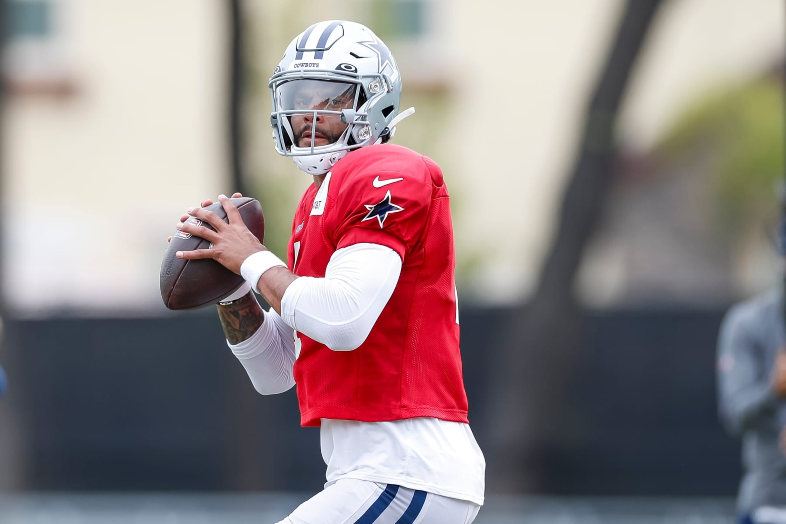 OXNARD, CA - AUGUST 15: Dallas Cowboys quarterback Dak Prescott (4) looks for an open receiver in a drill during the team's training camp at Marriott Residence Inn at River Ridge on August 15, 2023, in Oxnard, CA. (Photo by Brandon Sloter/Icon Sportswire via Getty Images)