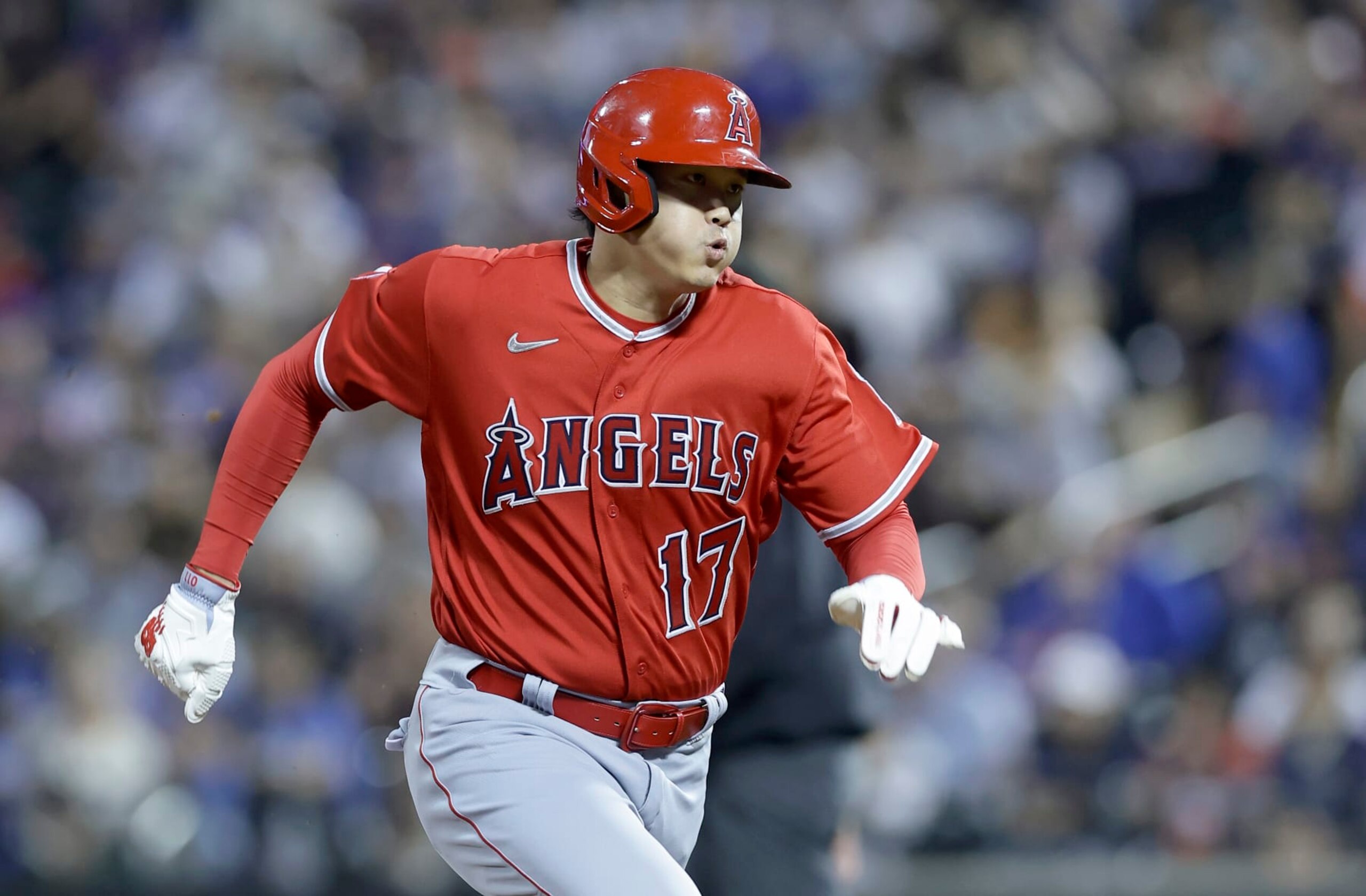 NEW YORK, NEW YORK - AUGUST 25: Shohei Ohtani #17 of the Los Angeles Angels advances to third base during the third inning  against the New York Mets at Citi Field on August 25, 2023 in New York City. The Angels defeated the Mets 3-1. (Photo by Jim McIsaac/Getty Images)