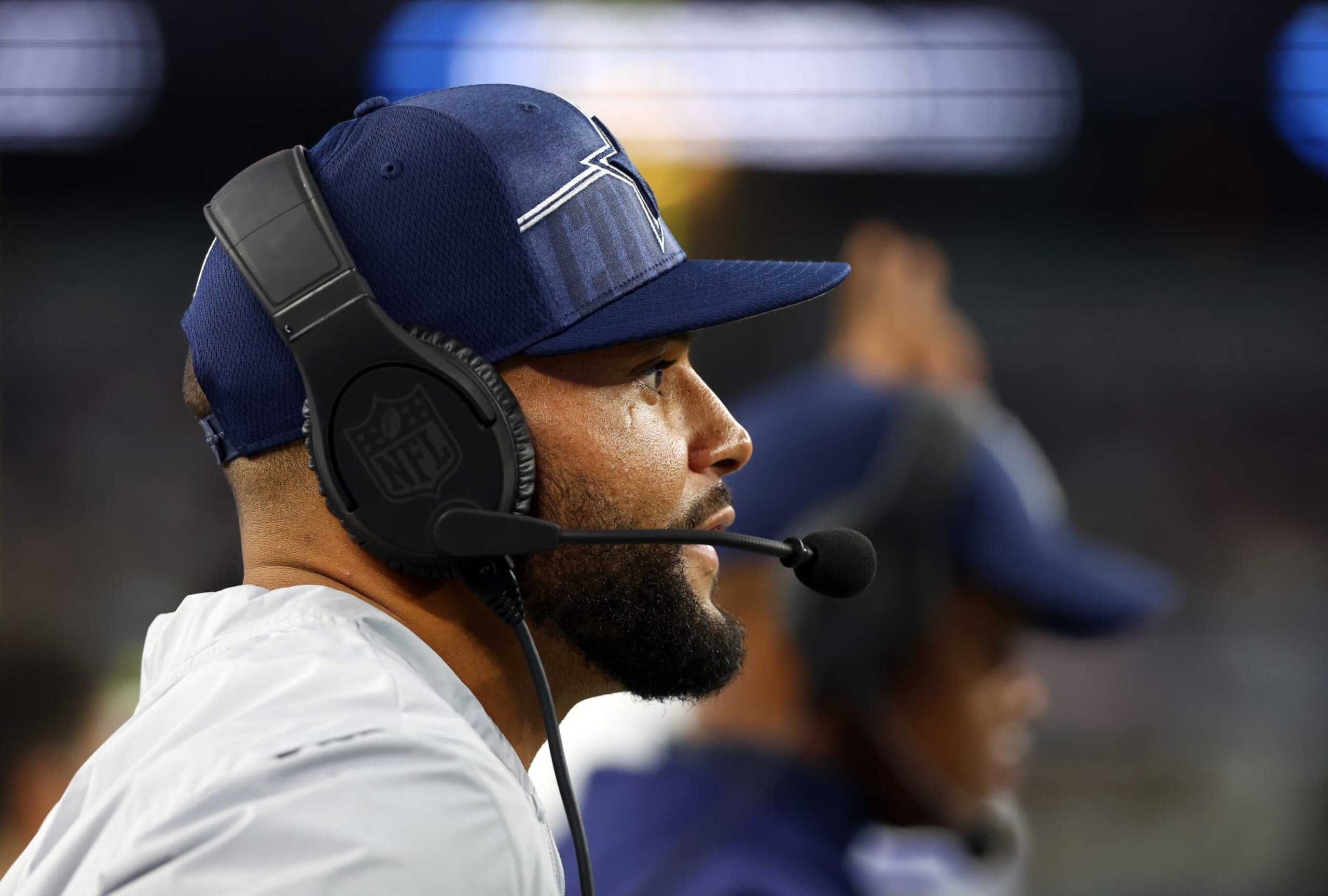 ARLINGTON, TEXAS - AUGUST 26: Dak Prescott #4 of the Dallas Cowboys watches the game against the Las Vegas Raiders from the sidelines in a preseason game at AT&T Stadium on August 26, 2023 in Arlington, Texas. (Photo by Richard Rodriguez/Getty Images)