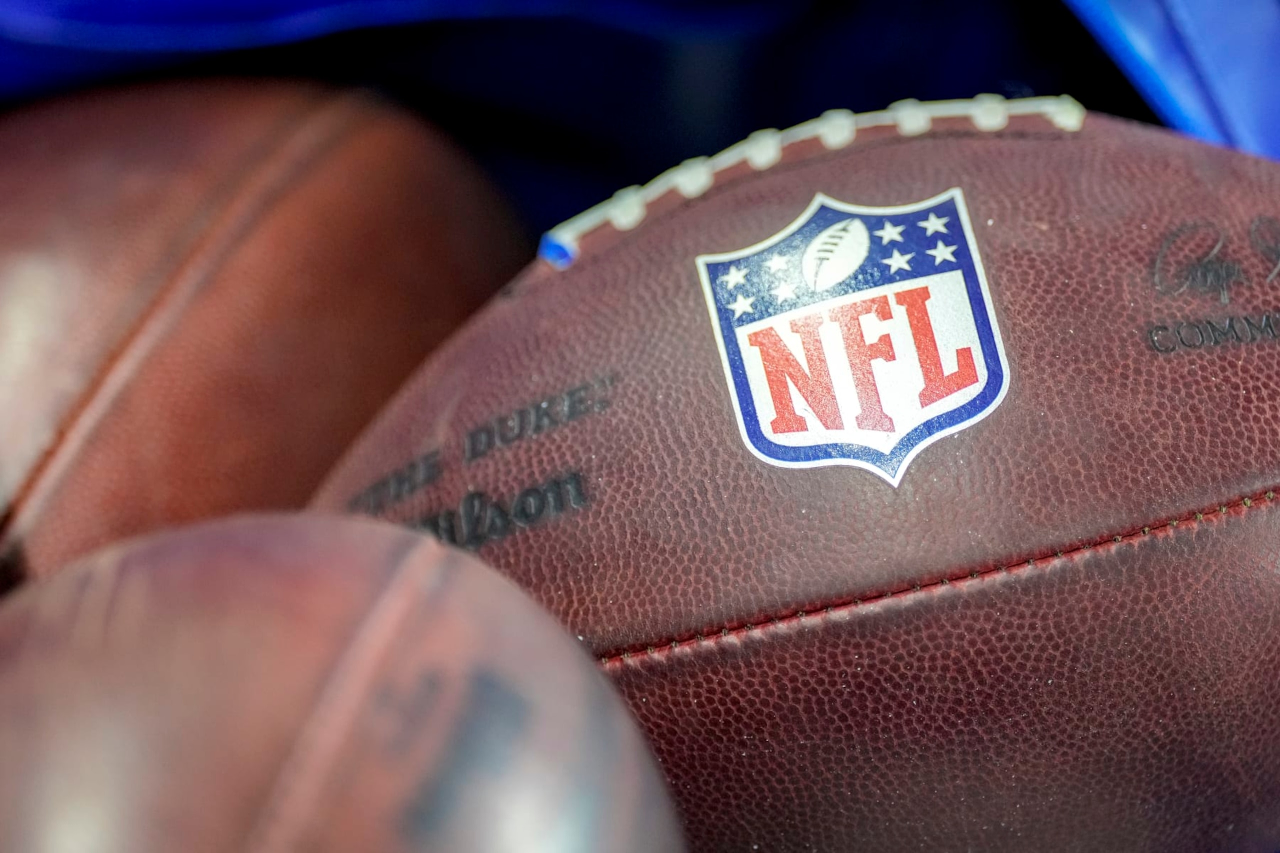 DETROIT, MICHIGAN - AUGUST 19: The NFL logo is pictured on a Wilson brand football during the preseason game between the Detroit Lions and Jacksonville Jaguars at Ford Field on August 19, 2023 in Detroit, Michigan. (Photo by Nic Antaya/Getty Images)