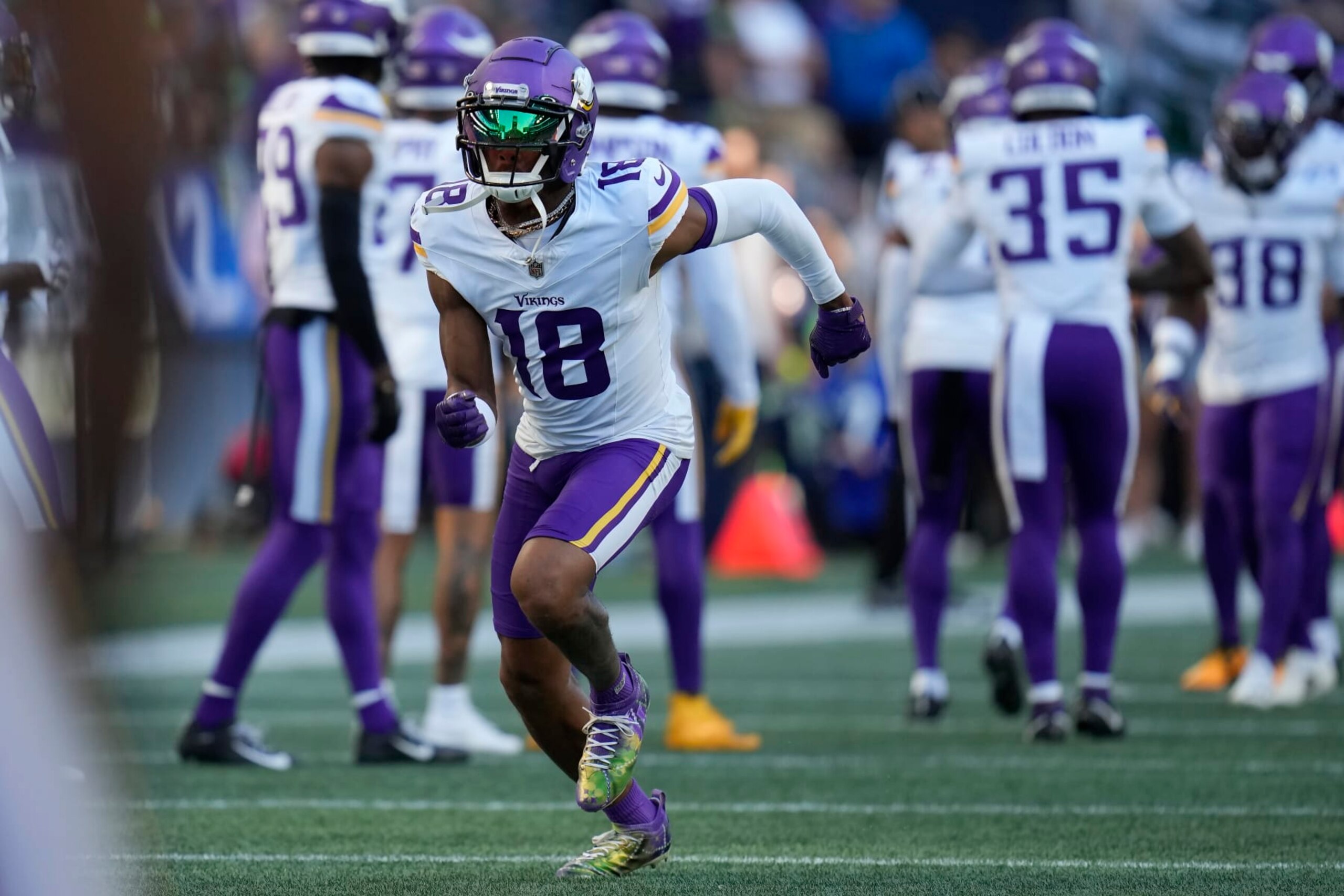 Minnesota Vikings wide receiver Justin Jefferson (18) warms up before an NFL preseason football game against the Seattle Seahawks in Seattle, Thursday, Aug. 10, 2023. (AP Photo/Gregory Bull)