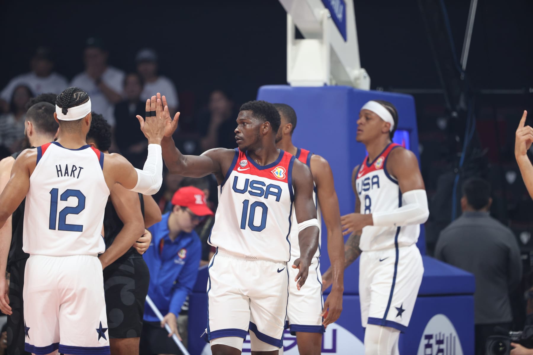 MANILA, PHILIPPINES - AUGUST 26: Anthony Edwards #10 high fives Josh Hart #12 of the USA Men's Senior National Team against New Zealand as part of the 2023 FIBA World Cup on August 26, 2023 at Mall of Asia Arena in Manila, Philippines. NOTE TO USER: User expressly acknowledges and agrees that, by downloading and/or using this photograph, user is consenting to the terms and conditions of the Getty Images License Agreement. Mandatory Copyright Notice: Copyright 2023 NBAE (Photo by Nathaniel S. Butler/NBAE via Getty Images)