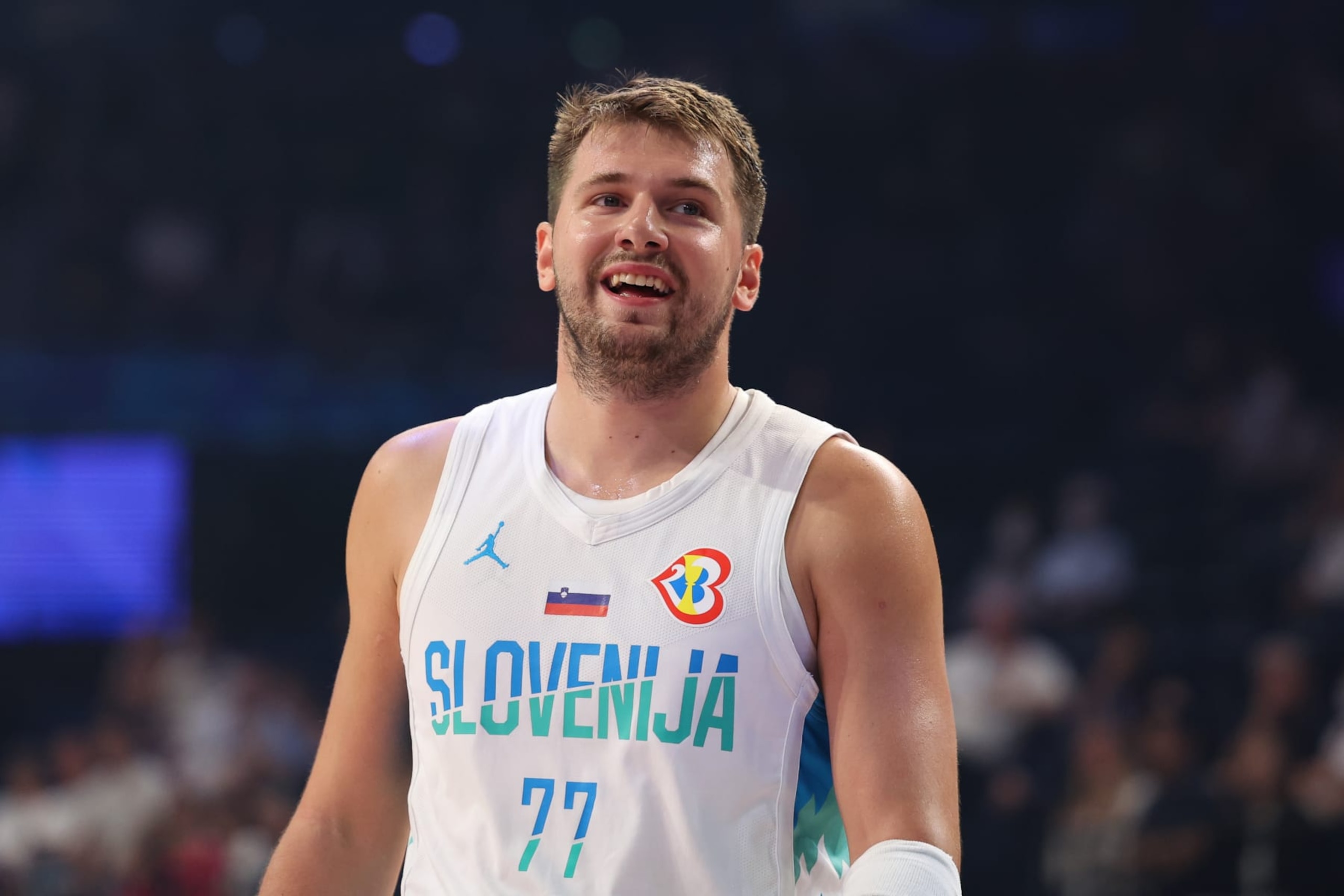 OKINAWA, JAPAN - AUGUST 26: Luka Doncic #77 of Slovenia looks on during the FIBA Basketball World Cup Group F game between Slovenia and Venezuela at Okinawa Arena on August 26, 2023 in Okinawa, Japan. (Photo by Takashi Aoyama/Getty Images)