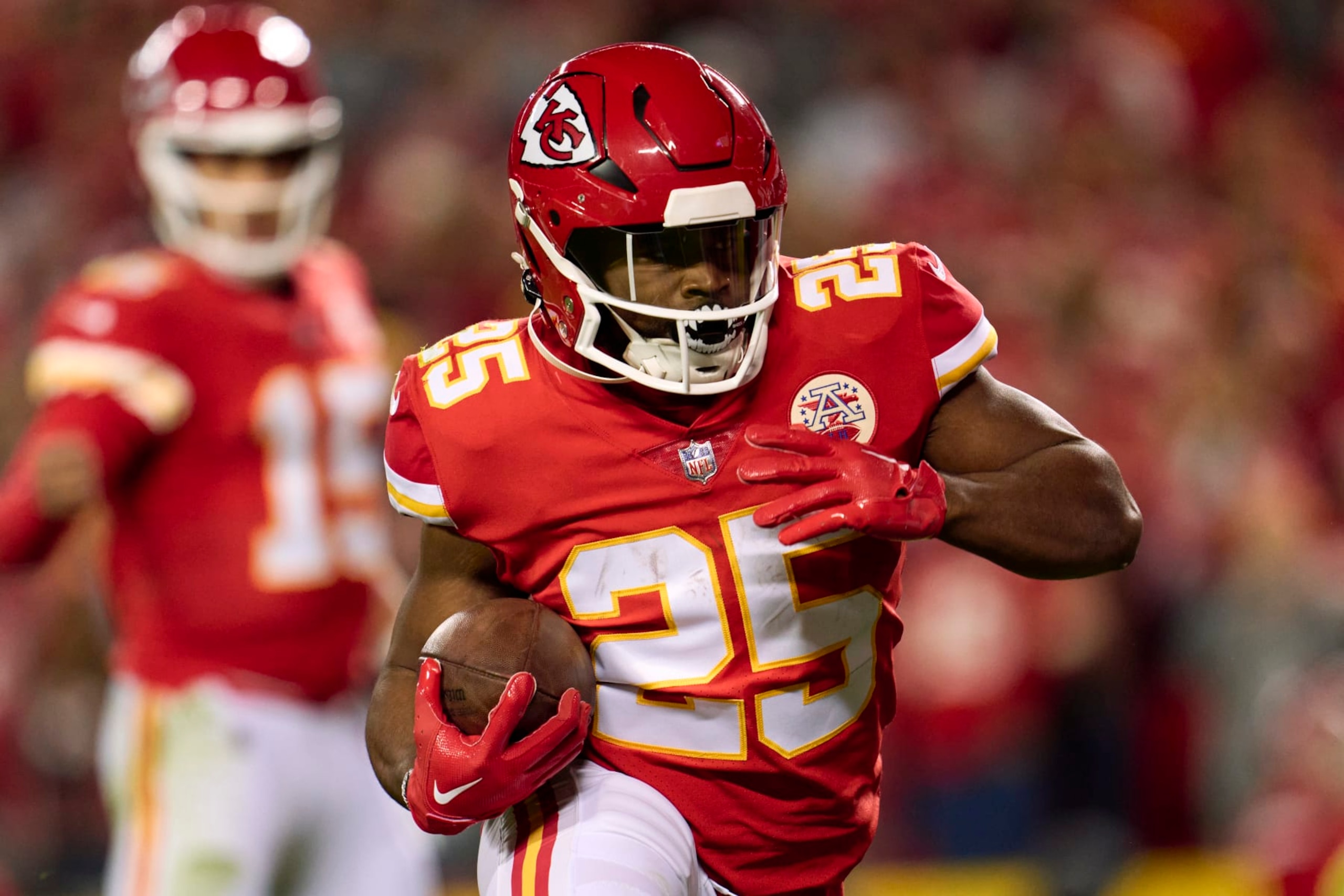 KANSAS CITY, MO - NOVEMBER 06: Clyde Edwards-Helaire #25 of the Kansas City Chiefs carries the ball against the Tennessee Titans during the first half at GEHA Field at Arrowhead Stadium on November 6, 2022 in Kansas City, Missouri. (Photo by Cooper Neill/Getty Images) KANSAS CITY, MO - NOVEMBER 06: Clyde Edwards-Helaire #25 of the Kansas City Chiefs carries the ball against the Tennessee Titans during the first half at GEHA Field at Arrowhead Stadium on November 6, 2022 in Kansas City, Missouri. (Photo by Cooper Neill/Getty Images)