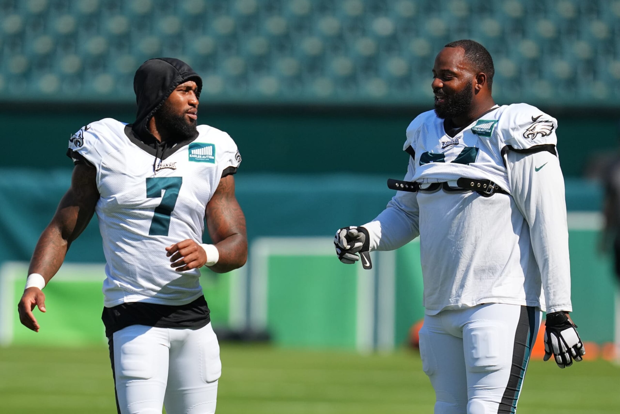 PHILADELPHIA, PENNSYLVANIA - AUGUST 9: Haason Reddick #7 of the Philadelphia Eagles talks to Fletcher Cox #91 during Training Camp at Lincoln Financial Field on August 9, 2023 in Philadelphia, Pennsylvania. (Photo by Mitchell Leff/Getty Images)