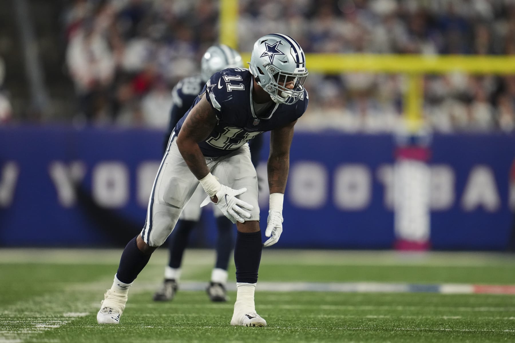 EAST RUTHERFORD, NJ - SEPTEMBER 26: Micah Parsons #11 of the Dallas Cowboys defends against the Dallas Cowboys at MetLife Stadium on September 26, 2022 in East Rutherford, New Jersey. (Photo by Cooper Neill/Getty Images)