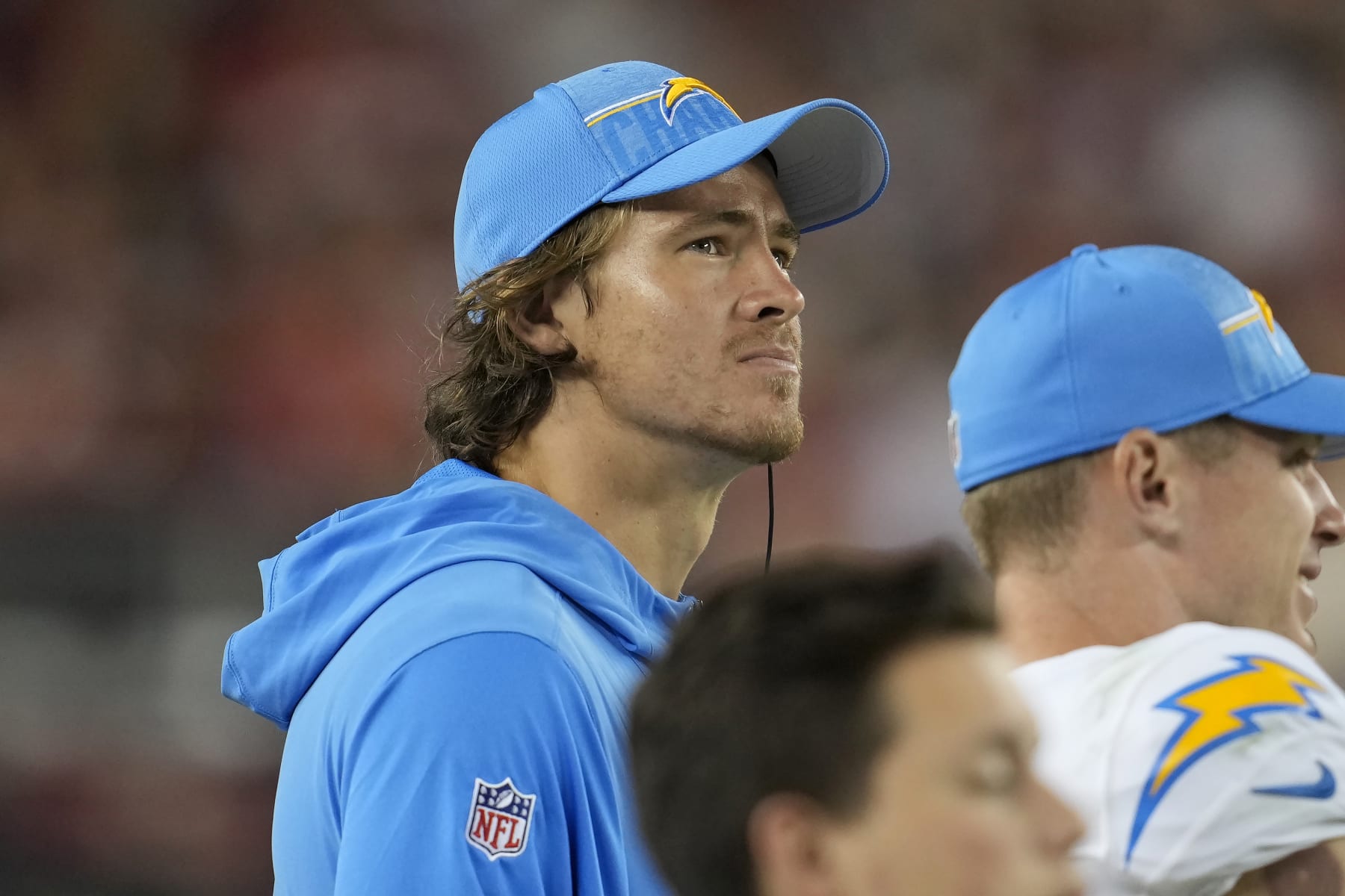 Los Angeles Chargers quarterback Justin Herbert watches during an NFL preseason football game between the San Francisco 49ers and the Chargers in Santa Clara, Calif., Friday, Aug. 25, 2023. (AP Photo/Jeff Chiu)